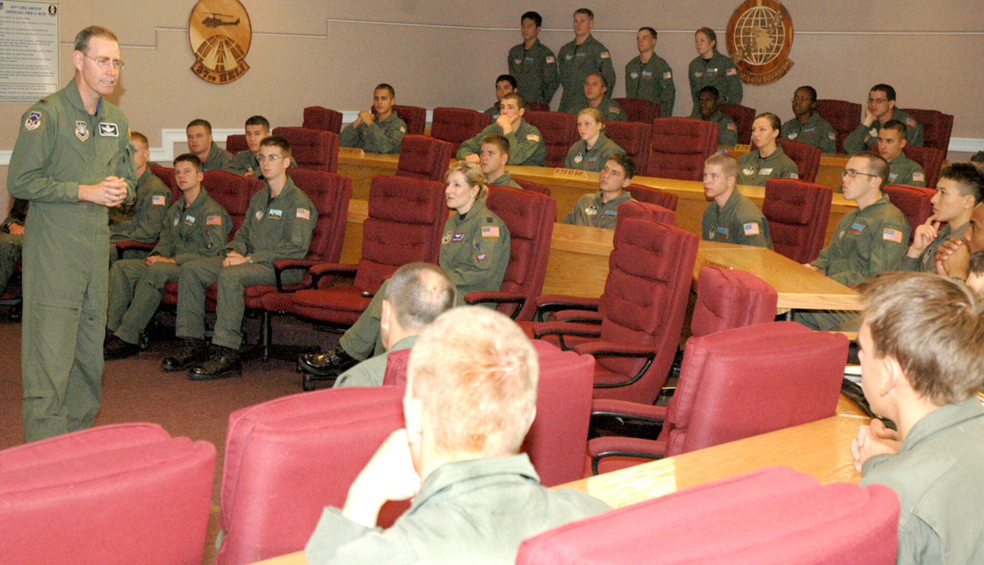 Col. Mike Morgan, 90th Space Wing commander, speaks to ROTC cadets after a mock pre-deployment briefing July 18. The cadets visited Warren as part of a special training program designed to familiarize them with the space mission here (Photo by Airman Alex Martinez).
