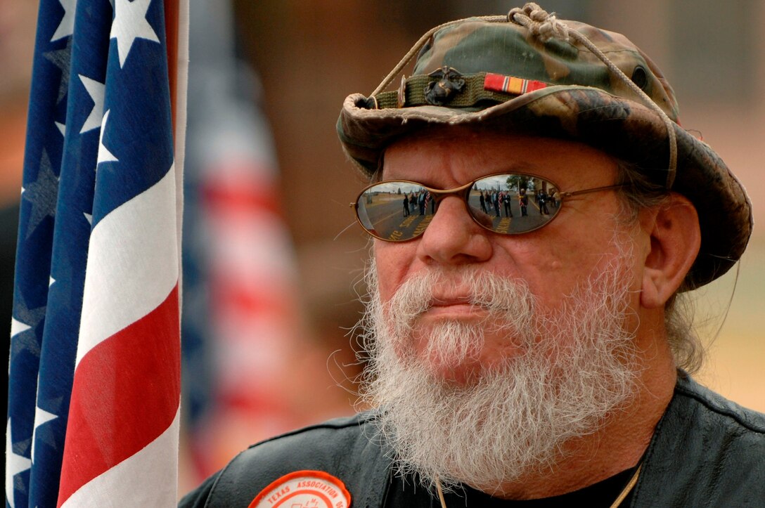 Jay Wilson, a member of the Patriot Guard Riders, waits for his son to return from a 6 month deployment to Southwest Asia in support of Operations IRAQI FREEDOM and ENDURING FREEDOM, July 27, 2007.  The Patriot Guard Riders are a group of motorcycle riders that attend military events to show respect and shield the service member and family from interruptions caused by protestors.  (U.S. Air Force photo/Staff Sgt. Michael B. Keller) (Released by Tech Sgt. Steven Wilson, 28th BW/PA)
