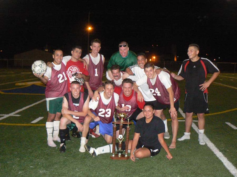DYESS AIR FORCE BASE, Texas -- After a long season and four games in three days for the playoffs, two of which were back-to-back (160 straight minutes) and one of which was won in a shootout, the 317th Airlift Group intramural soccer team claimed its second base title in a row July 26.  (Photo provided by 317th Airlift Group)