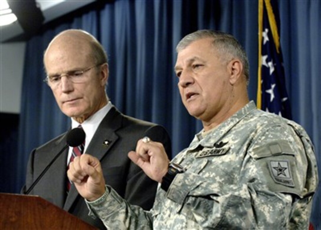 Secretary of the Army Peter Geren (left) and Army Vice Chief of Staff Gen. Richard Cody (right) conduct a joint press conference to discuss the manner in which the Army handled the investigation into the death of Cpl. Patrick Tillman in the Pentagon on July 31, 2007.  