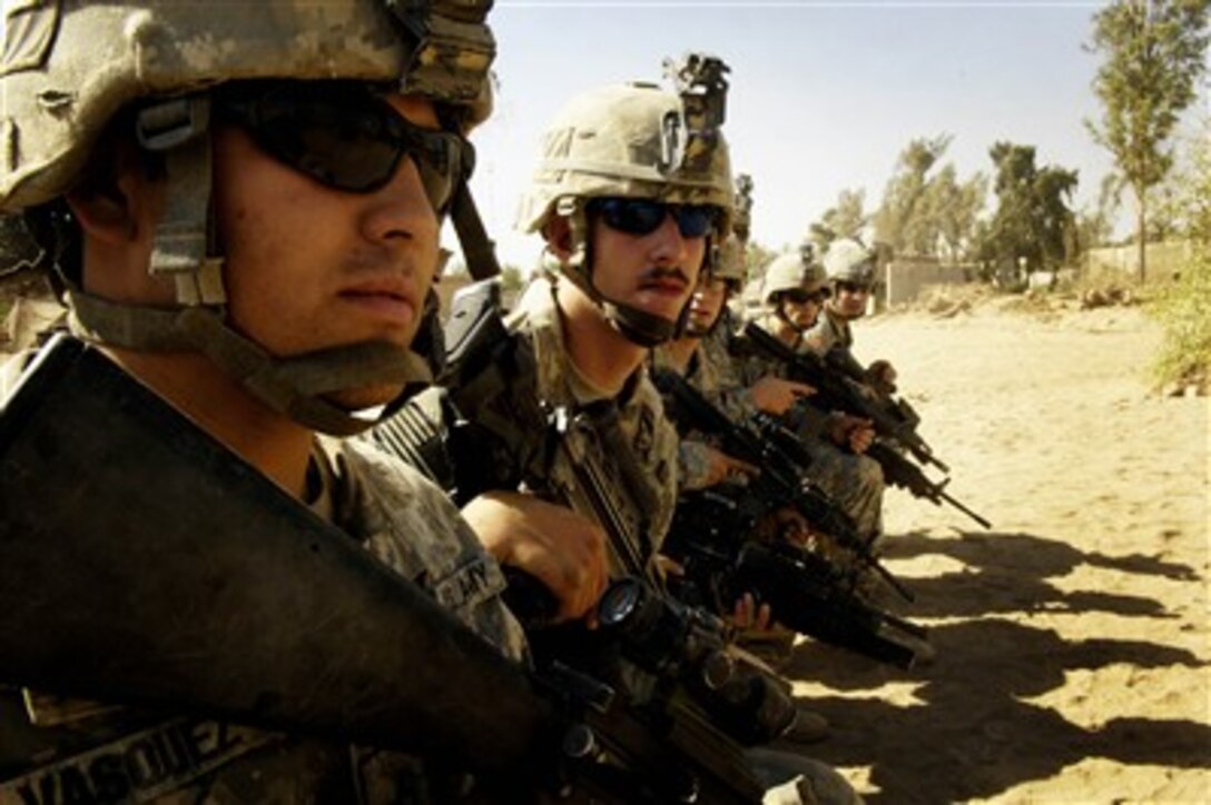 U.S. Army soldiers rehearse for a night air assault mission in Al Wahida, Iraq, on July 2, 2007.  Soldiers of 1st Battalion, 15th Infantry Regiment, 3rd Brigade Combat Team, 3rd Infantry Division will conduct the air assault to capture suspected insurgents and locate possible weapons caches.  