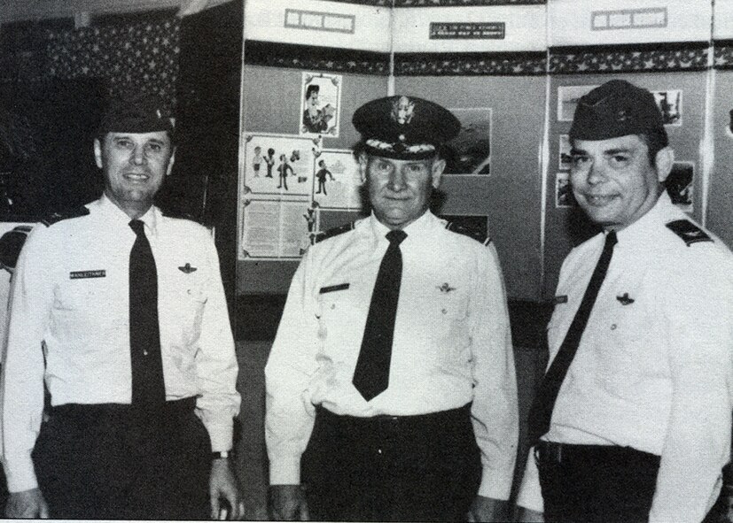Maj. Gen. Sidney Novaresi, former commander of the 940th Military Airlift Group, the forerunner of the 940th Air Refueling Wing, is flanked in this 1978 picture by, left, Col. Charles B. Coleman, and, right, Col. James C. Wahleithner. They were at the dedication of the 403rd Rescue and Weather Reconnaissance Wing at Keesler AFB, Miss. Today, Col. (later Maj. Gen.) Wahleithner's son, Staff Sgt. Jared Wahleithner, serves as a boom operator for the 314th Air Refueling Squadron, Beale AFB, Calif. General Novaresi commanded the 314th in 1960 when it was a Troop Carrier Squadron at McClellan AFB. (U.S. Air Force Photo)  