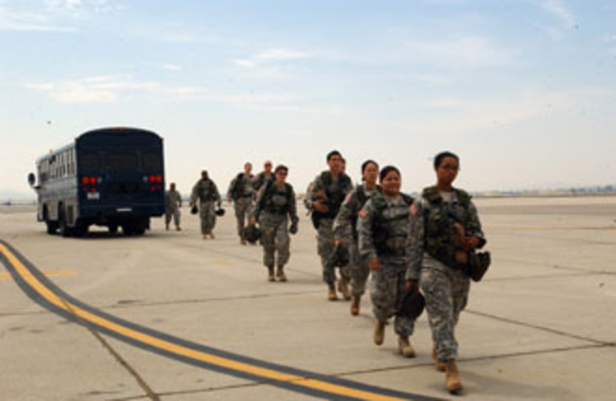 Soldiers from the Army’s 304th Sustainment Brigade stationed at March Air Reserve Base, Calif., get off a bus to board a C-17 Globemaster III that will take them to San Clemente Island to participate in exercise Patriot Hook. The five days of training took place at three California airfields and allowed military branches to come together to practice operational capabilities in a deployed setting.
U.S. Air Force photo by Senior Airman Sarah N. Sutliff