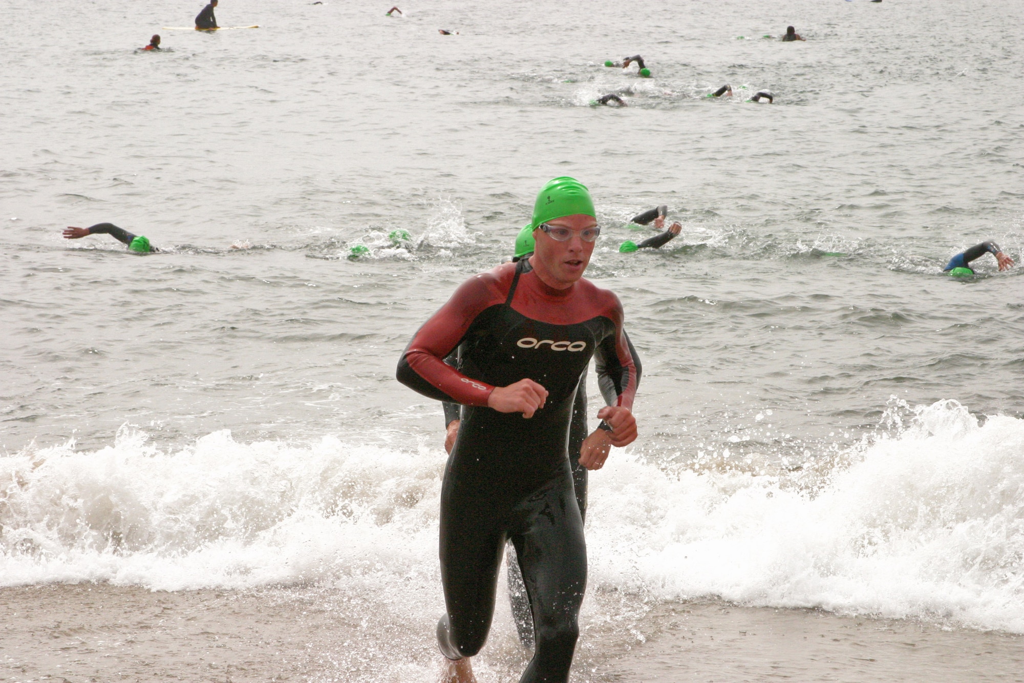 Tech. Sgt. Michael Berquist finishes the swim event during the 2007 Armed Forces Triathlon Championship at Naval Base Ventura County-Point Mugu, Calif., July 28.  Sergeant Berquist, from Fairchild Air Force Base, Wash., was the third Air Force member to finish and came in sixth overall in the men's division.  (U.S. Air Force photo/Staff Sgt. Ty Reyes)