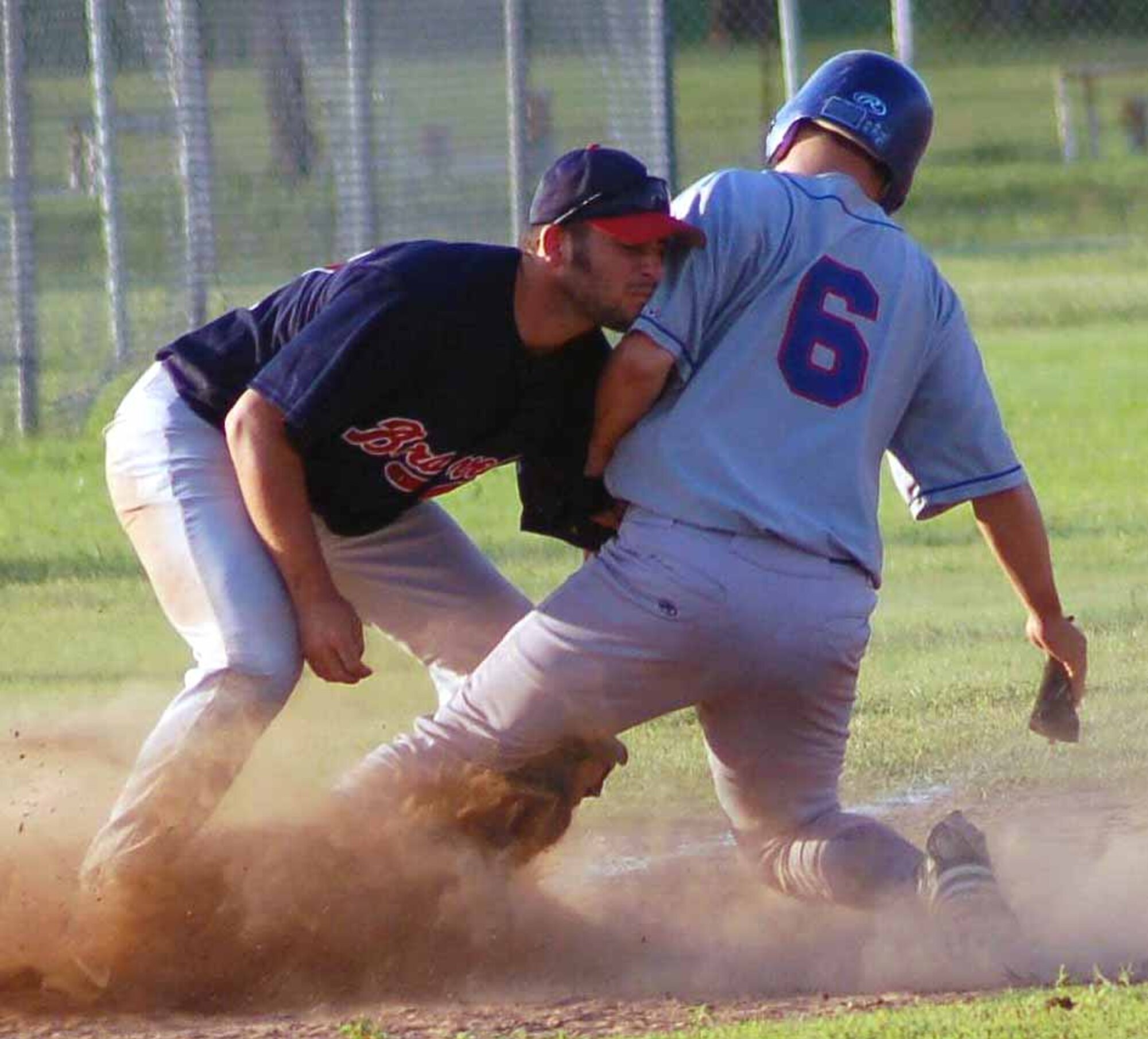 Tinker Rangers base runner Christopher Brooks safely steals third in the sixth inning of a July 29 games against the Braves. (Air Force photo by John E. Banks)