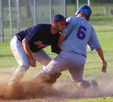 Tinker Rangers base runner Christopher Brooks safely steals third in the sixth inning of a July 29 games against the Braves. (Air Force photo by John E. Banks)