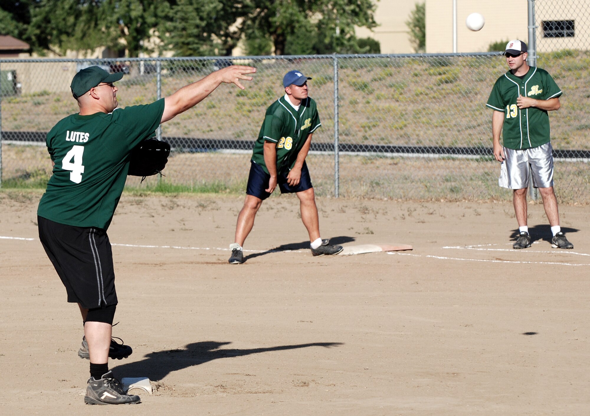 FAIRCHILD AIR FORCE BASE, Wash. -- Tech. Sgt. Albin Lutes, 336th Training Squadron NCOIC of Survival supply, pitches the ball to the catcher during the 2007 Intramural Softball Championship game July 27. The game was close until the 336th scored four in the sixth to put the game out of reach:  the 336th Training Group beat the 92nd Operations Group 17-12. (U.S. Air Force Photo / Staff Sgt. Mikel Daniel