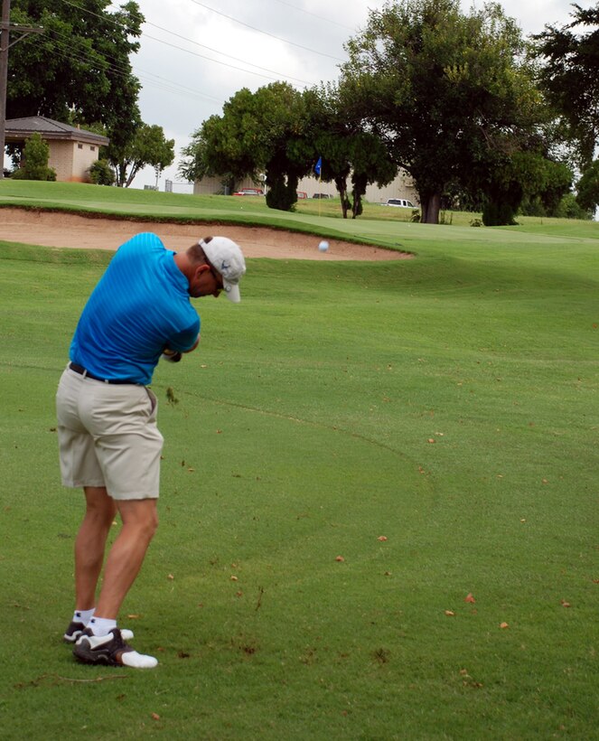Col. Steven McKay, 82nd Mission Support Group commander, hits the ball at a farewell golf tournament held in honor of Colonel McKay Aug. 2 at the Wind Creek Golf Course. (U.S. Air Force photo/Cadet Third Class Justin North)