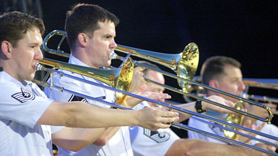 Something old, something new! Trombonists Tech. Sgt. Ben Patterson and Master Sgt. Joe Jackson play a supporting role during the Airmen of Note’s annual alumni Concert at the U.S. Capitol. Photo Credit: U.S. Air Force Tech. Sgt. Jim Varhegyi  
