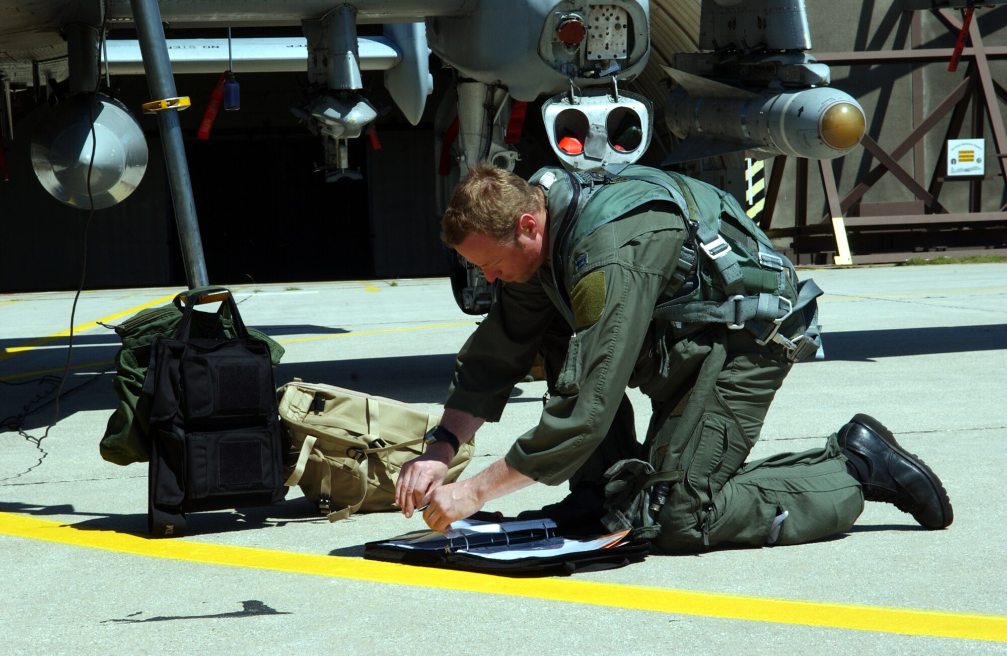 SPANGDAHLEM AIR BASE, Germany – Capt. Joe Turnham, 81st Fighter Squadron pilot, performs his after flight checks upon his landing at Spangdahlem Air Base Aug. 1. Members of the 81st Fighter Squadron and AMU traveled to Lakenheath when the Spangdahlem AB runway closed in June for repairs. (U.S. Air Force photo/Airman 1st Class Allen Pollard)