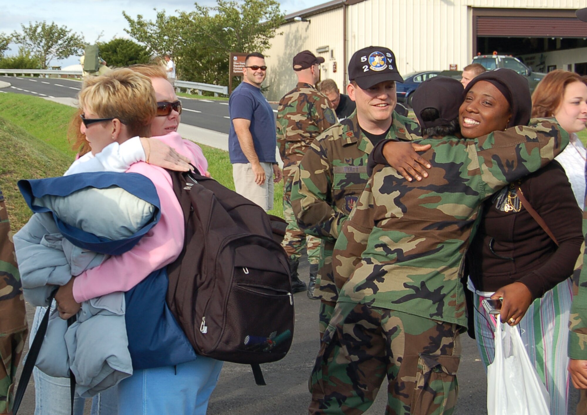 SPANGDAHLEM AIR BASE, Germany – Airmen from across the base greet returning members of the 81st Aircraft Maintenance Unit after their return from a deployment to Royal Air Force Lakenheath, England July 31. Members of the 81st Fighter Squadron and AMU traveled to Lakenheath when the Spangdahlem Air Base runway closed in June for repairs. (U.S. Air Force photo/Staff Sgt. Tammie Moore)