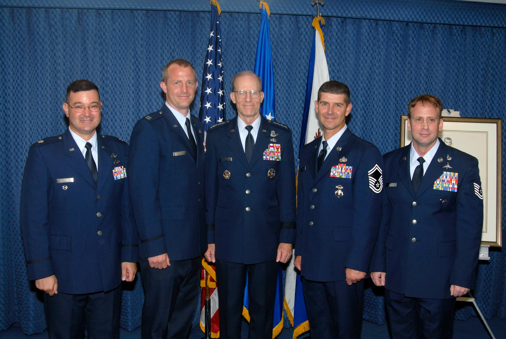 Gen. John D.W. Corley (center), vice chief of staff of the Air Force, stands with 2006 Lance P. Sijan recipients (left to right) Lt. Col. Eric Axelbank, Capt. Matthew Allen, Senior Master Sgt. David John and Tech. Sgt. Shannon Cruz. The Lance Sijan P. Award is given annually and recognizes Airmen who demonstrate outstanding leadership abilities while assigned to their organizations. (U.S. Air Force photo/Tech Sgt. Cohen A. Young)
