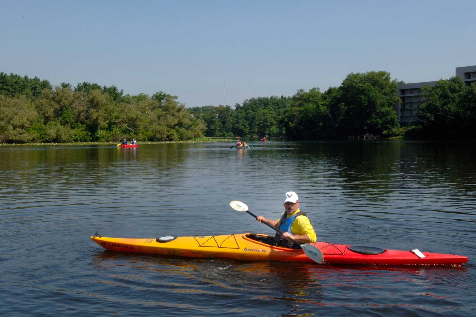 Mike Trudeau, Electronic Systems Center Safety Office, paddles along the Charles River in Newton, Mass. during a trip sponsored by the Boston Vet Center. Hanscom volunteers helped with trip details and shared memories with the former servicemembers. (U.S. Air Force photo by Jan Abate).