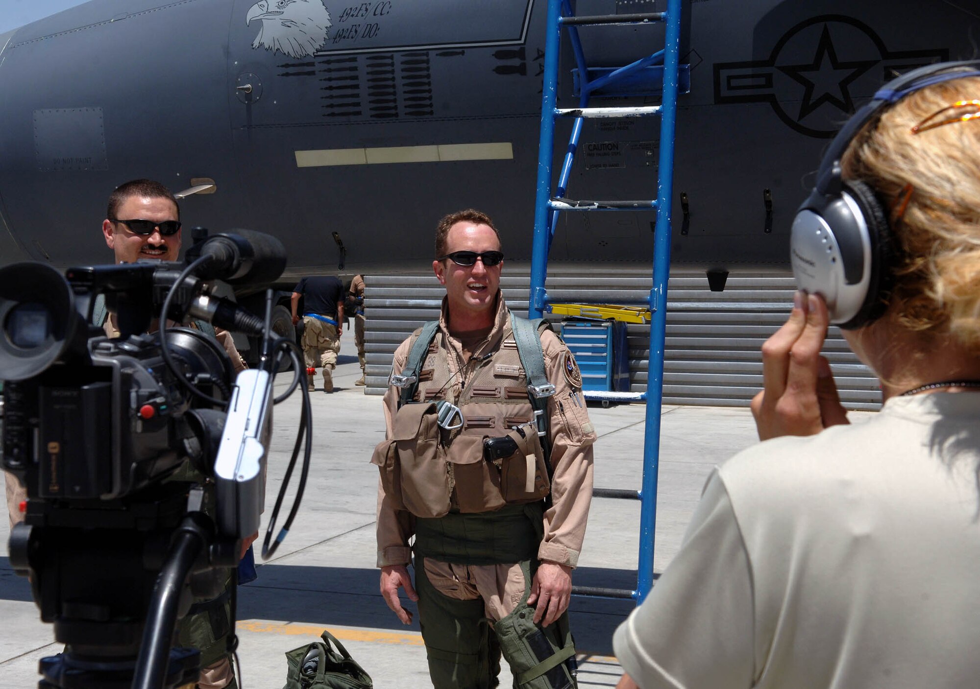 Lt. Col. Dave Iverson, 492nd Expeditionary Fighter Squadron director of operations, speaks with Air Force News about recently becoming the 15th pilot to achieve 3,000 flight hours upon landing after a mission July 25 at Bagram Airfield, Afghanistan. (U.S. Air Force photo)