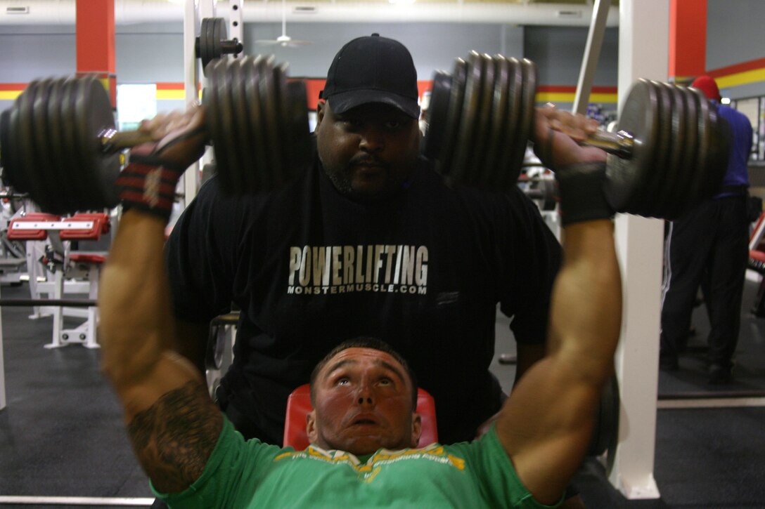 MARINE CORPS BASE CAMP LEJEUNE, N.C. (Aug. 8, 2007) ? Sgt. Michael B. Binkley (below), a scout squad leader with 2nd Light Armored Reconnaissance Battalion, 2nd Marine Division, weight trains with workout partner, Herman ?Big Herm? Canada.  Binkley works out vigorously and maintains a strict diet to make him competitive at national and world levels in power lifting.