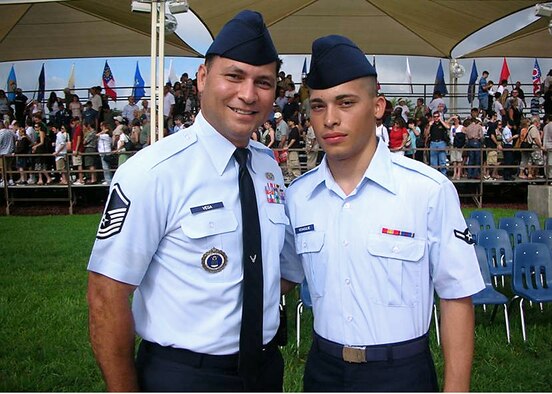 Air Force Recruiter, Master Sgt. Carmelo Vega and his son.