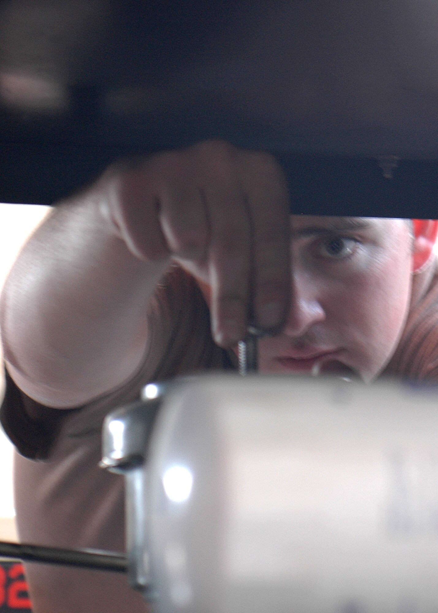 Senior Airman Case McCarty, 49th Maintenance Squadron, checks over a piece of Aerospace Ground Equipment. Airman McCarty is part of the AGE flight. (U.S. Air Force photo/Airman 1st Class Heather Stanton)