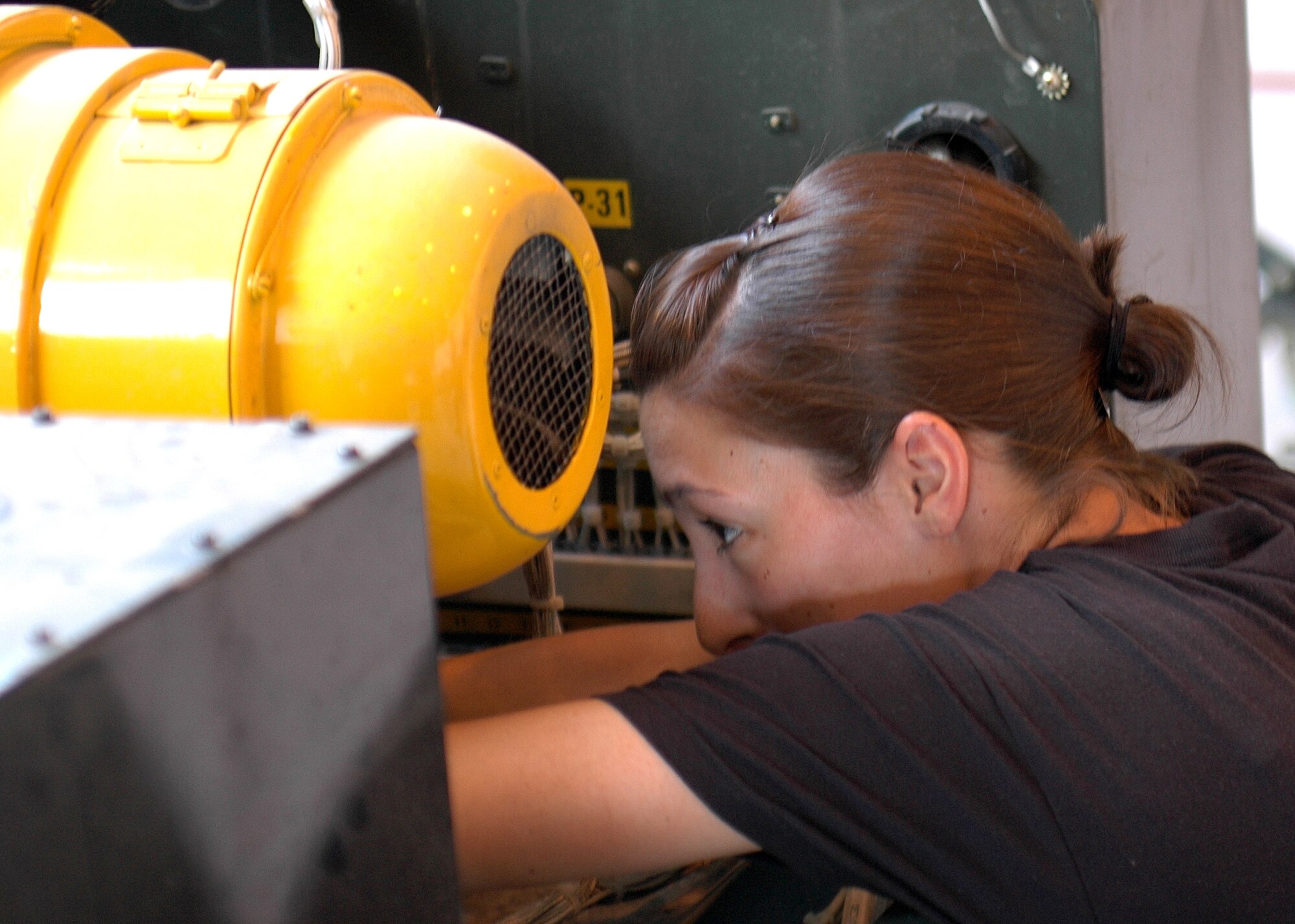 Airman 1st Class Rebecca Sanner, 49th Maintenance Squadron, works on a -60 jet engine generator. Airman Sanner is part of the Aerospace Ground Equipment flight. (U.S. Air Force photo/Airman 1st Class Heather Stanton)