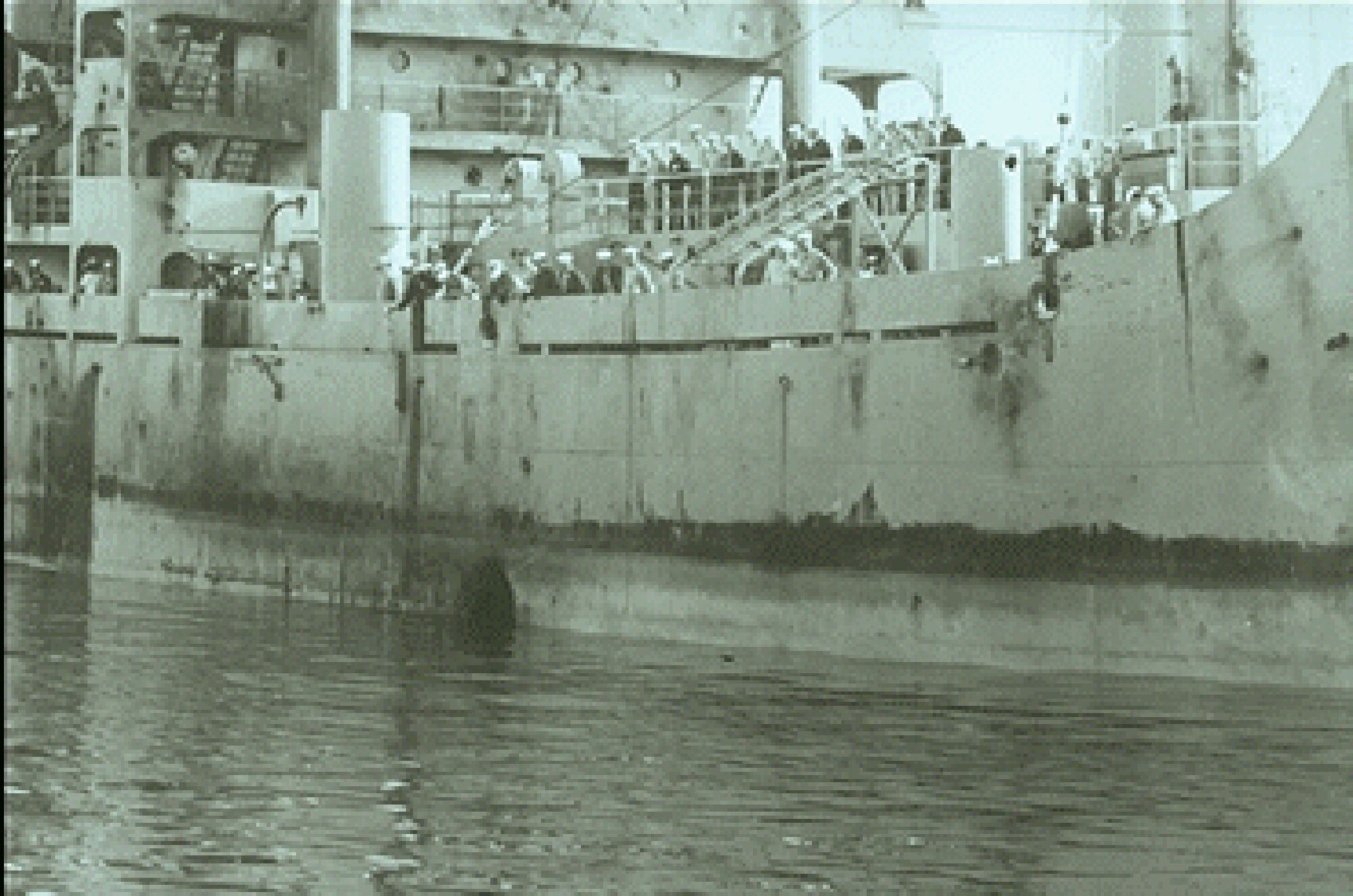 The USS Liberty is left listing to starboard after a sustained air and sea attack July 8, 1967. (Courtesy photo)