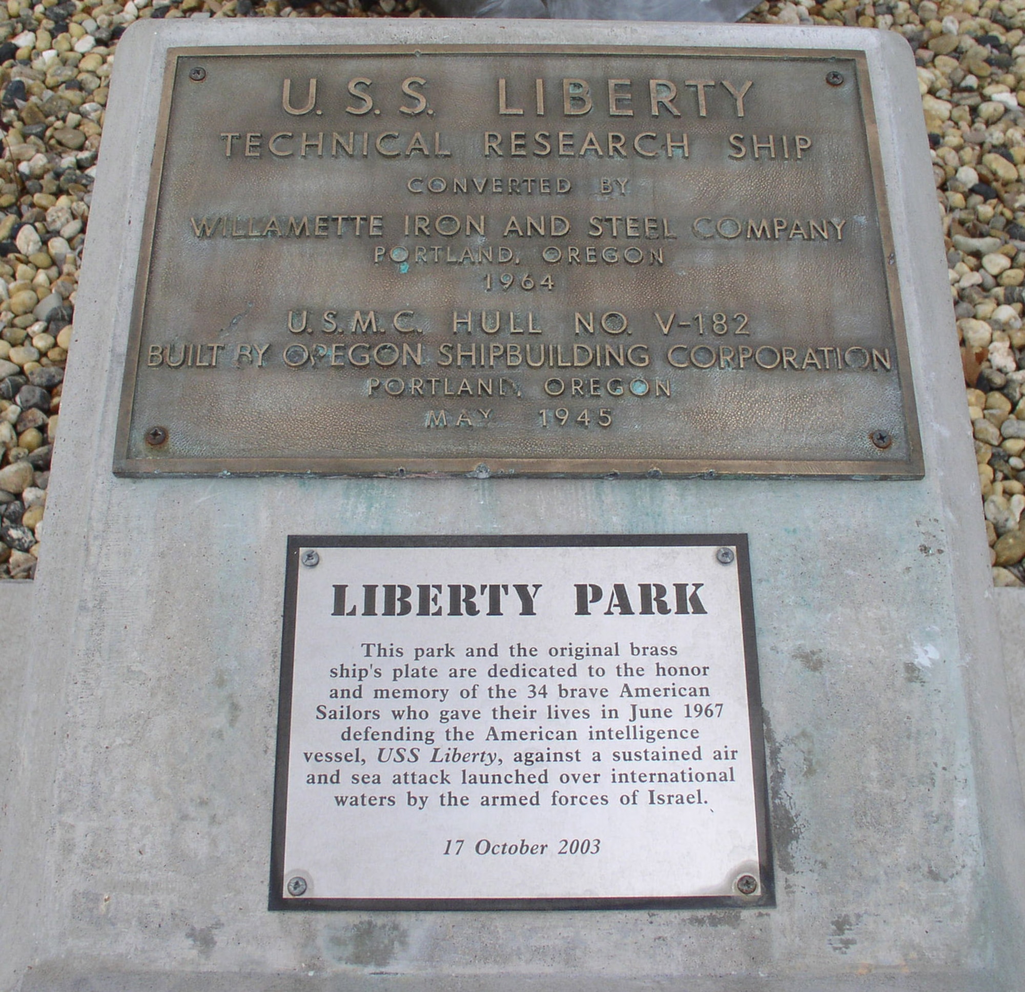 USS Liberty’s original brass ship’s plate and Liberty Park dedication. (U.S. Air Force photo by Airman 1st Class Luis Loza Gutierrez)