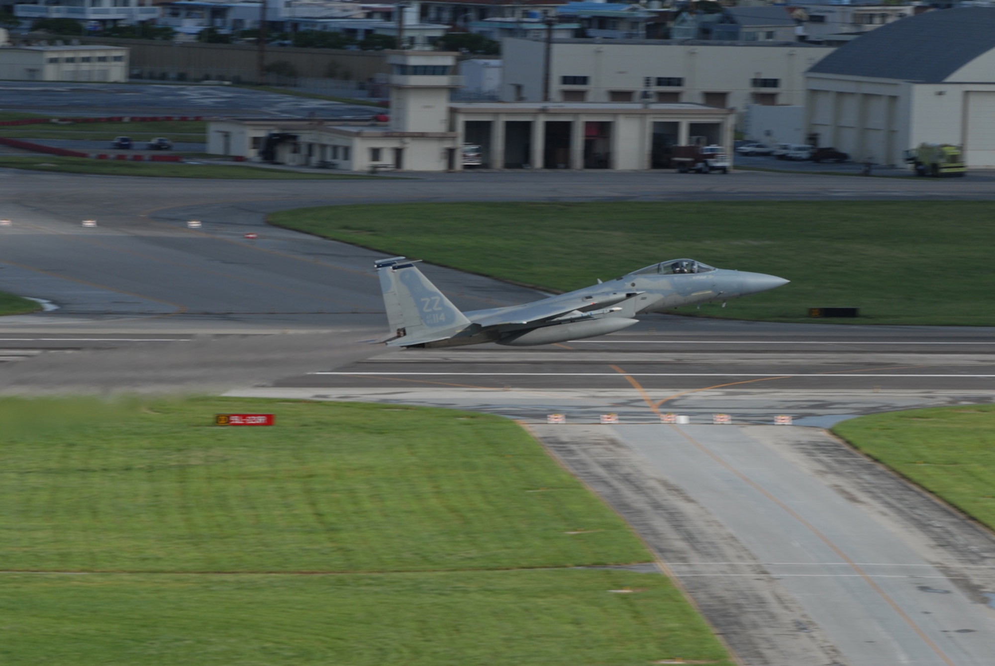 A 44th Fighter Squadron F-15C Eagle takes off at Kadena Air Base, Japan, Aug. 5, 2007, en route to Guam in support of Exercise Valiant Shield.  More than 400 Airmen and F-15Cs, KC-135R Stratotankers and E-3 Airborne Warning and Control System aircraft are participating in the weeklong Pacific Command joint exercise which focuses on integrated joint training to enable real-world proficiency in sustaining forces and detecting, locating, tracking and engaging units at sea, in the air, on land, and cyberspace in response to a range of mission areas.   U.S. Air Force photo/Senior Airman Darnell T. Cannady