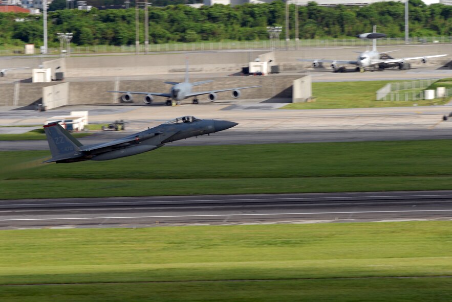 A 44th Fighter Squadron F-15C Eagle takes off at Kadena Air Base, Japan, Aug. 5, 2007, en route to Guam in support of Exercise Valiant Shield.  More than 400 Airmen and F-15Cs, KC-135R Stratotankers and E-3 Airborne Warning and Control System aircraft are participating in the weeklong Pacific Command joint exercise which focuses on integrated joint training to enable real-world proficiency in sustaining forces and detecting, locating, tracking and engaging units at sea, in the air, on land, and cyberspace in response to a range of mission areas.   U.S. Air Force photo/Senior Airman Darnell T. Cannady