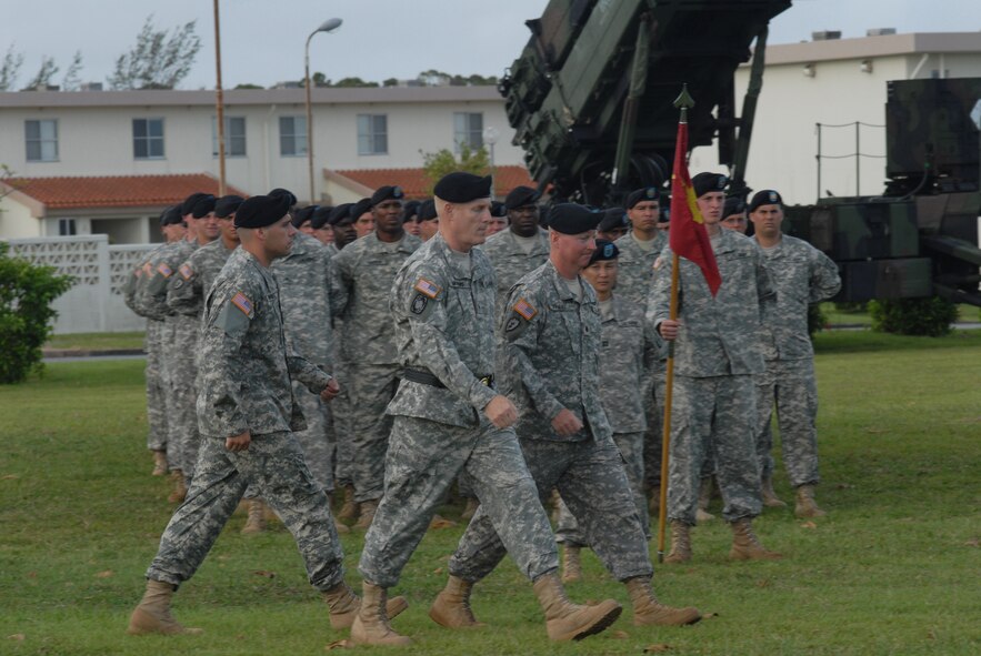 KADENA AIR BASE, Japan -- From left: Army Maj. David Browning, Brig. Gen. Roger Mathews and Lt. Col. Edward O'Neill conduct a pass in review of the battalion formation at the assumption command for the 1-1 Air Defense Artillery Battalion at Kadena Air Base, Japan, on Aug. 7, 2007. Army Lt. Col. Edward O'Neill assumed command of the 600-person battalion. The unit activated at the base in November 2006, and conducts missile defense for the region with the Patriot missile system in accordance with the U.S. and Japan bilateral security agreements. General Mathews is the 94th Air and Missile Defense Command commander at Fort Shafter and Major Browning is the 1-1 ADA executive officer. (U.S. Air Force photo/Senior Airman Darnell Cannady)