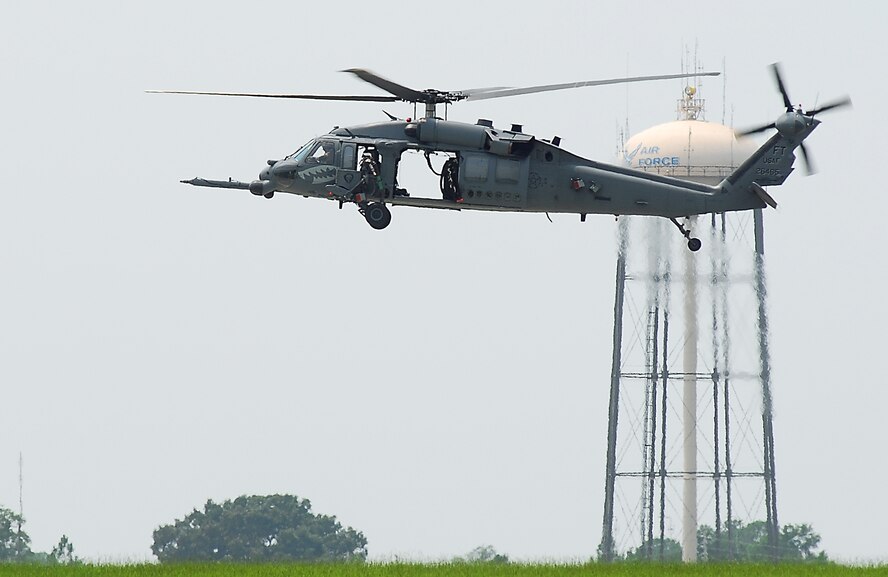 An HH-60G Pave Hawk performs practice landing approaches over Moody Air Force Base, Ga., Aug. 6. The primary mission of the Pave Hawk is to conduct day or night combat search and rescue operations into hostile environments to recover downed aircrew or other isolated personnel during war. (U.S. Air Force photo by Tech. Sgt. Parker Gyokeres)