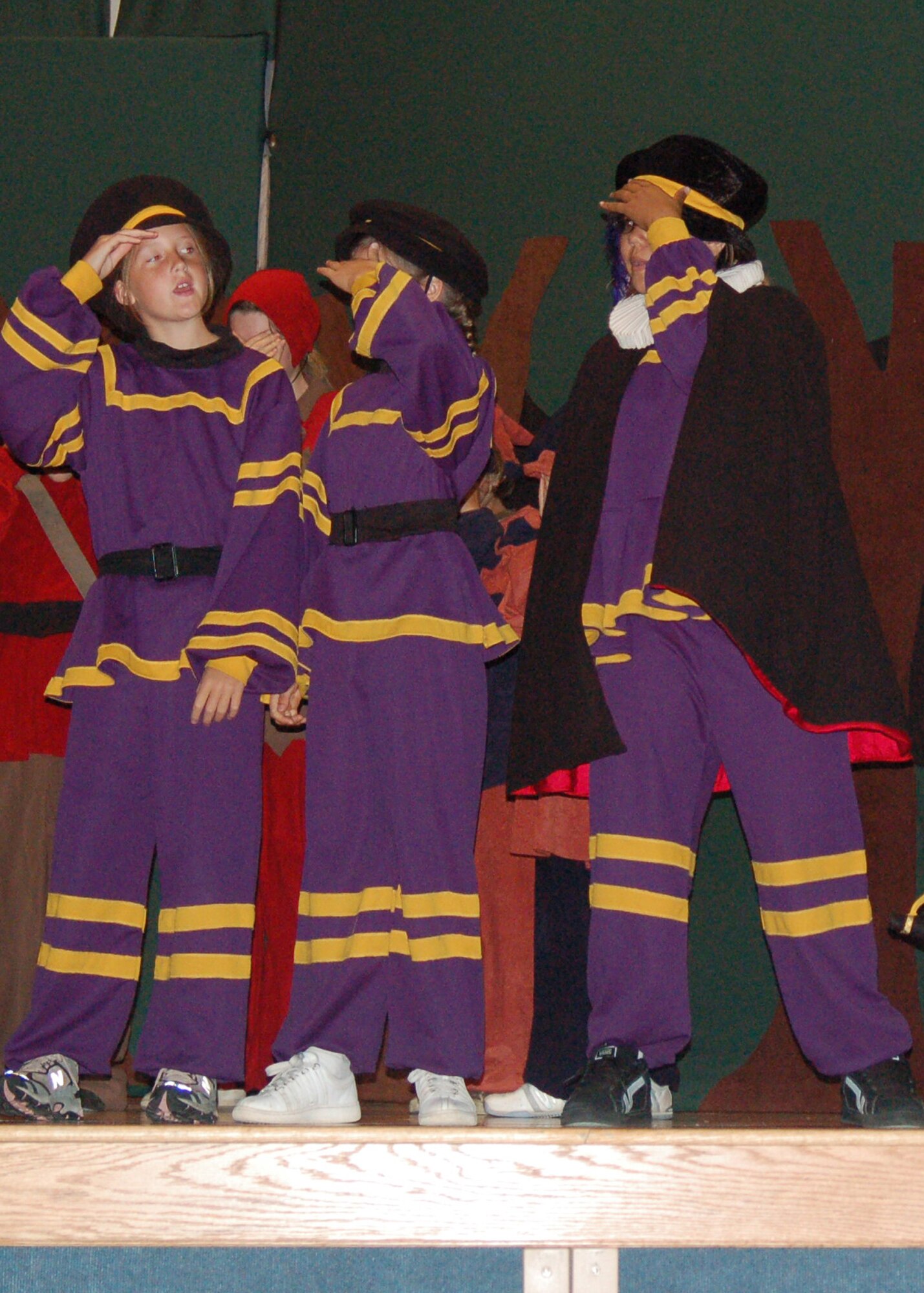 EIELSON AIR FORCE BASE, Alaska--Eielson youth portray Prince John's guards searching for the Prince of Thieves in Sherwood Forest during their performance of Robin Hood July 27 at the base theater.  Annually, the Missoula Children's Theater staff visits Air Force bases across the world with sets and props to allow children to become the stars. The MCT's mission is the development of life skills in children through participation in the performing arts. (U.S. Air Force photo by Misty Campbell)