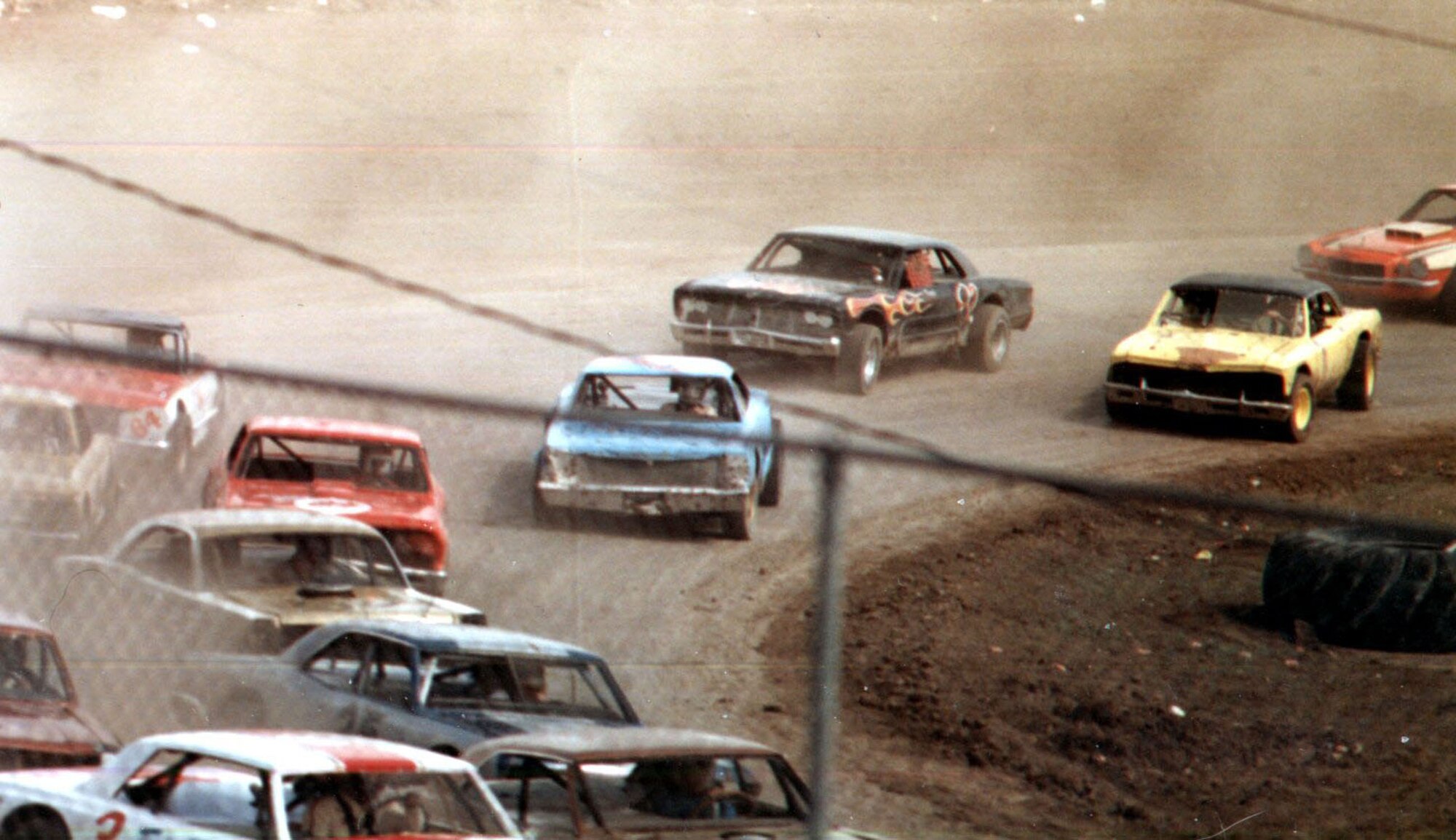 Racers round a turn at the Electric City Speedway in Great Falls, Mont. (circa 1970).  The speedway is the longest constinuously running track in Montana.  (Courtesy photo).
