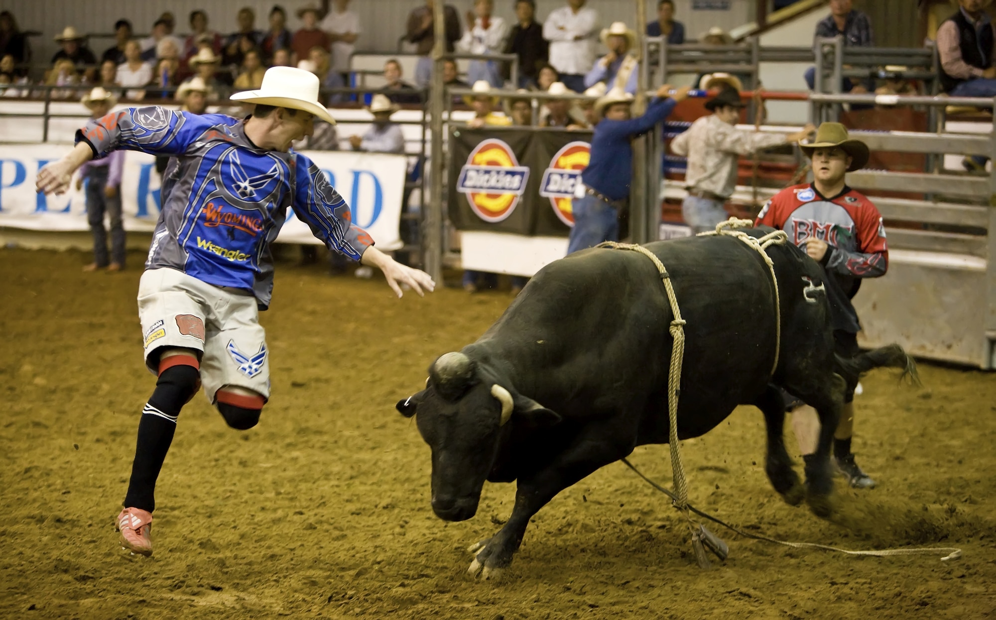 VANDENBERG AIR FORCE BASE, Calif. -- During the Santa Barbara 2007 Fiesta Rodeo on Aug. 4, Capt. Jeremy Sparks draws a bull's attention so the fallen rider can move to safety.  As a  professional bull fighter, Captain Sparks antagonizes bulls while dodging attacks, scoring points the closer he gets to the bull.  He served as a a missileer with the 321st Missile Squadron at F.E. Warren AFB, Wyo., and now teaches ROTC at the University of Wyoming in Laramie, Wyo.   (U.S. Air Force photo/Capt. Eric Chin)