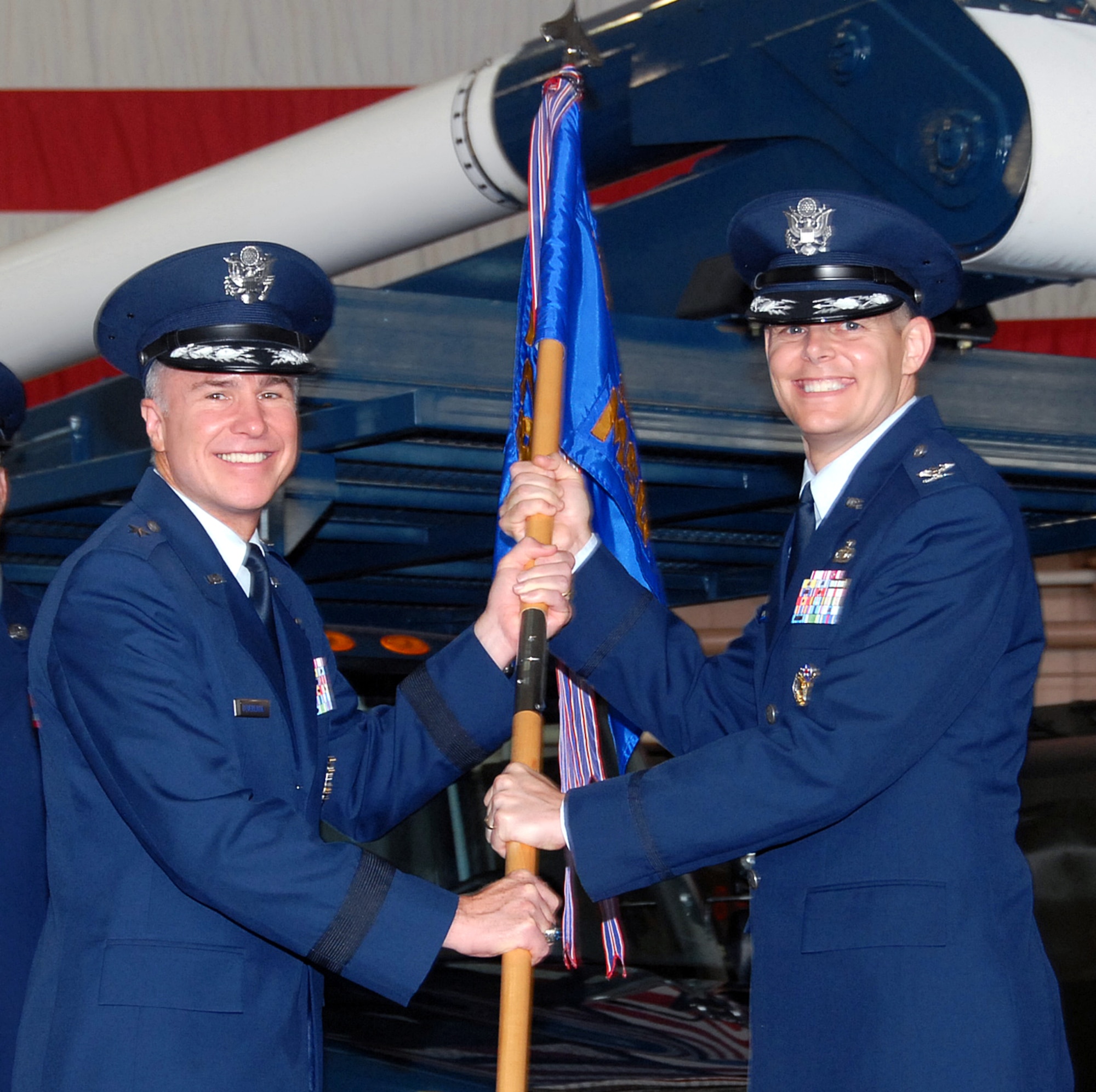 Col. Richard Lipsey accepts command of the 82nd Mission Support Group from Brig. Gen. Richard Devereaux, 82nd Training Wing commander, during the change of command ceremony in Hangar 1045 Aug. 3. (U.S. Air Force photo/Mike Litteken)