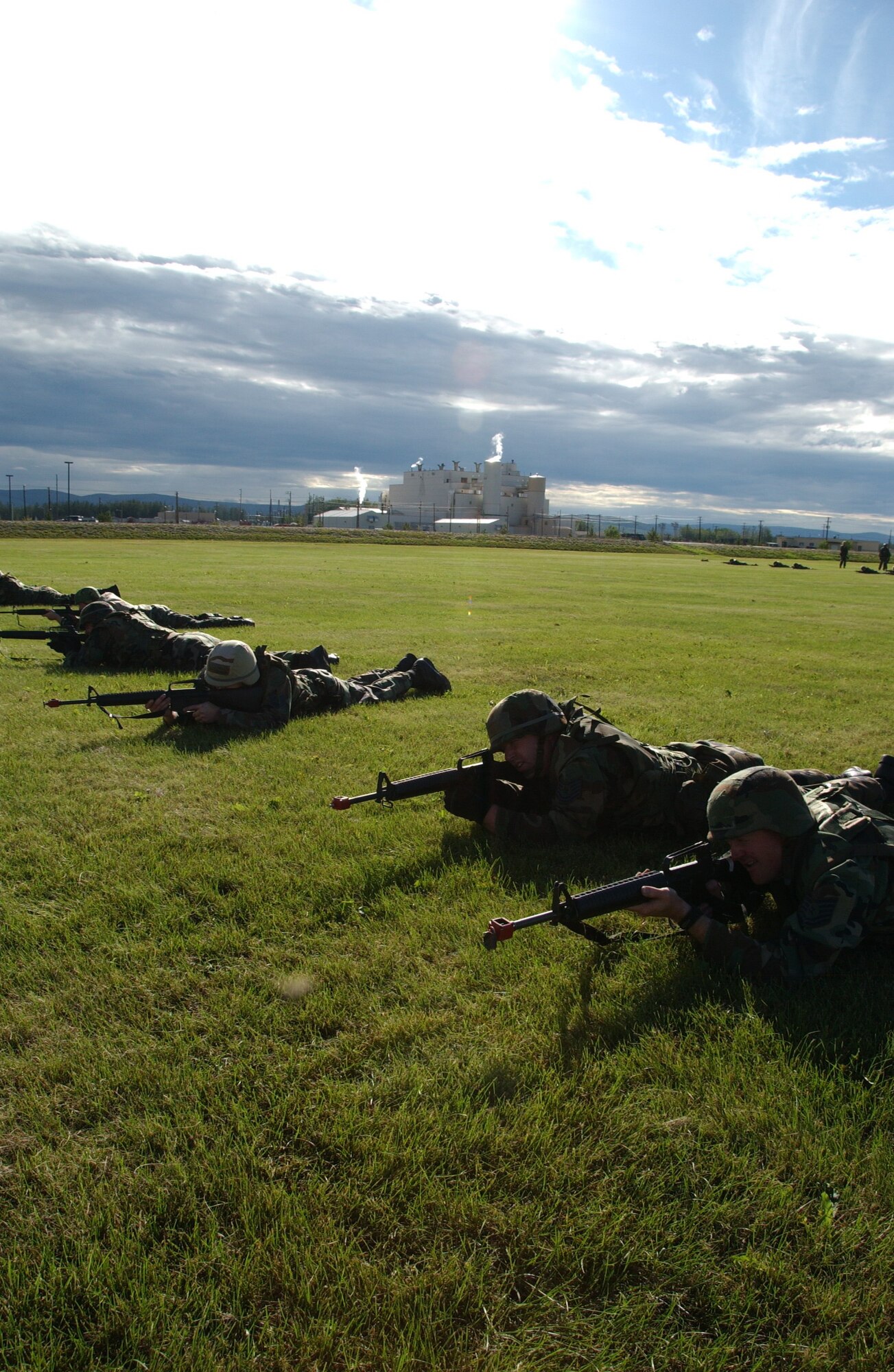 EIELSON AIR FORCE BASE, Alaska -- Airmen practice low crawling as a part of combat skill training August 3, 2007. This training allows airmen the necessary skills to perform and adapt in a combat environment while deployed to an overseas location.  (U.S. Air Force photo by Airman 1st Class Christopher Griffin)