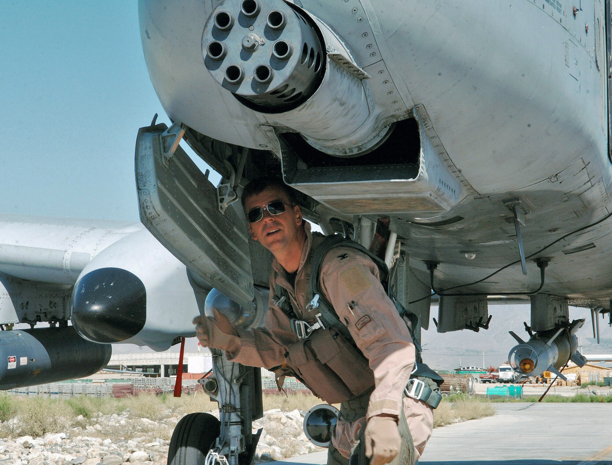 Col. Bruce McClintock performs a pre-flight inspection of his A-10 Thunderbolt II at Bagram Air Base, Afghanistan, prior to a mission.  Col. McClintock, the 455th Air Expeditionary Wing vice commander, is deployed from Davis-Monthan Air Force Base, Ariz. (U.S. Air Force photo/Staff Sgt. Craig Seals)