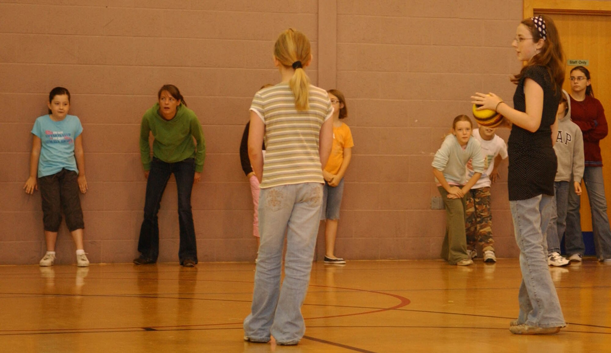 Kids get ready to run during a game of dodgeball at the RAF Mildenhall Youth Center. (U.S. Air Force photo by Joe Strouth)