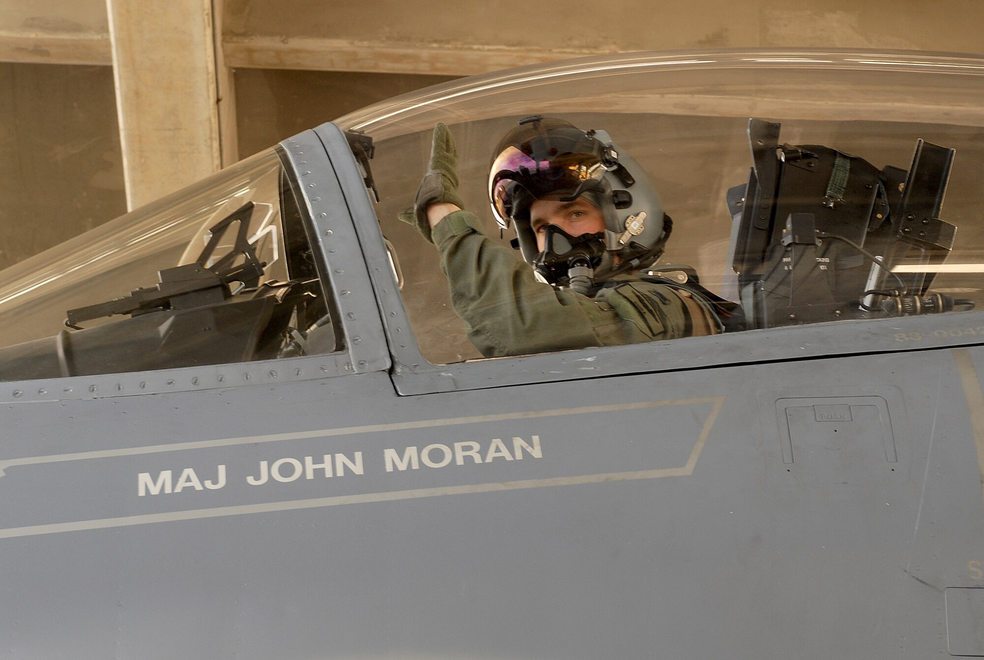 First Lt. John Fischer waves as he begins to taxi his F-15C Eagle at Kadena Air Base, Japan, Aug. 5, 2007, prior to takeoff en route to Guam in support of Exercise Valiant Shield.  More than 400 base Airmen and F-15Cs, KC-135R Stratotankers and E-3 Airborne Warning and Control System aircraft are participating in the weeklong Pacific Command joint exercise which focuses on integrated joint training to enable real-world proficiency in sustaining forces and detecting, locating, tracking and engaging units at sea, in the air, on land, and cyberspace in response to a range of mission areas. Lieutenant Fischer is a 44th Fighter Squadron pilot. 
U.S. Air Force photo/Airman 1st Class Kelly Timney