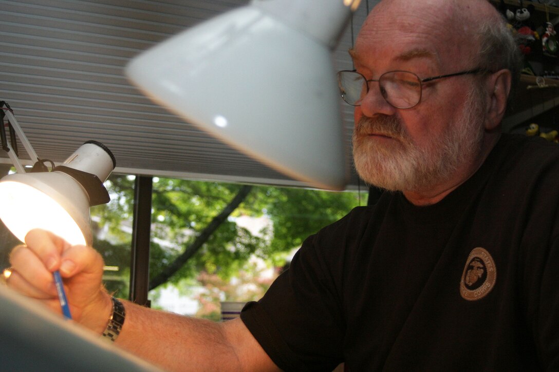 EDMONDS, Wash. (Aug. 7, 2007)- Michael Reagan, 60, a Seattle native sketches a portrait of a service member who died while serving in Iraq in support of Operation Iraqi Freedom. The former Marine and Vietnam veteran has drawn portraits for the families of fallen service members for the past three and a half years. His more than 775 portraits are completely free to the families. (Official U.S. Marine Corps photo by Cpl. Lucian Friel (RELEASED)