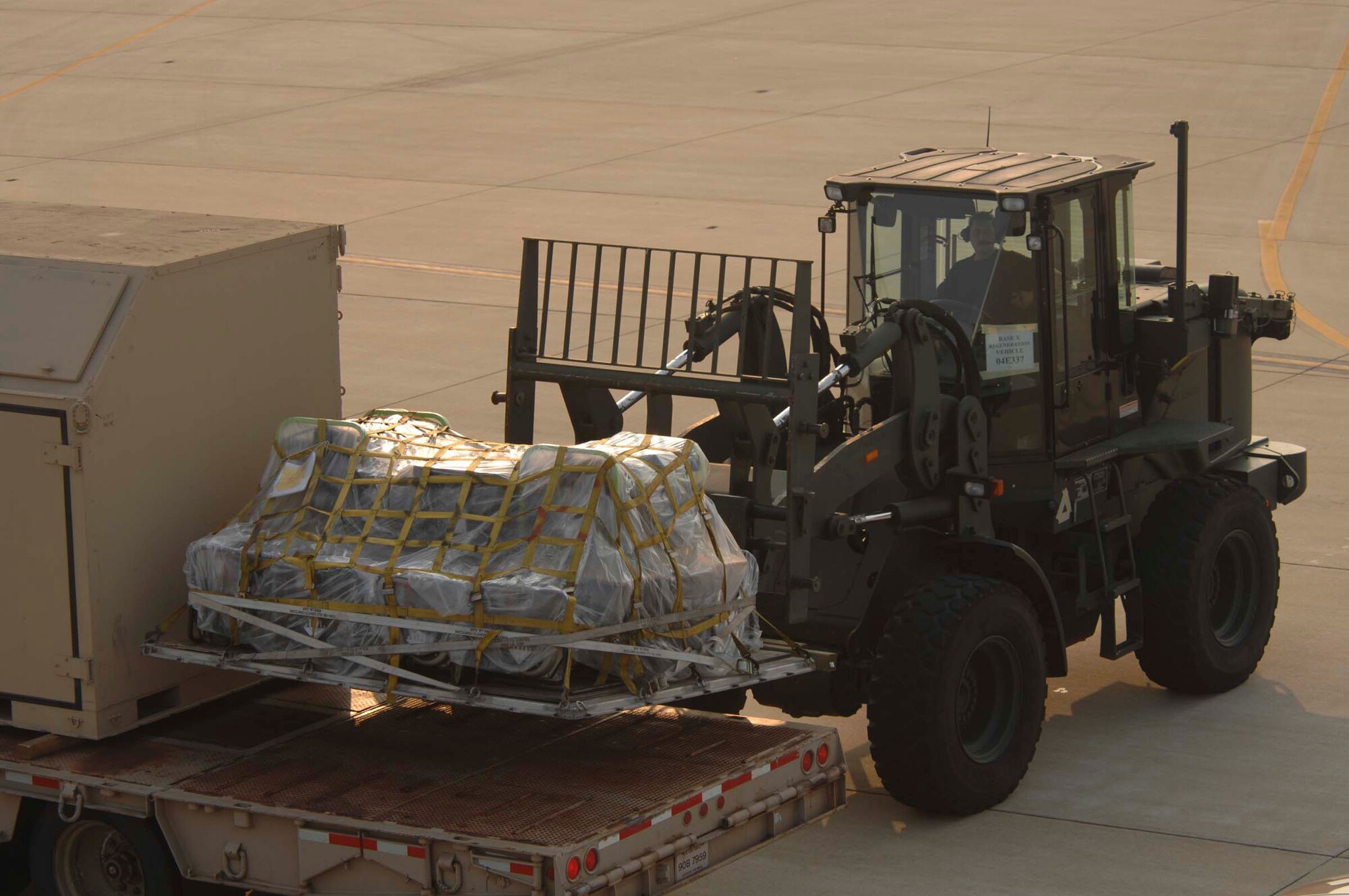 SHAW AIR FORCE BASE, S.C. -- Staff Sgt. Chad Wallace, 20th Logistics Readiness Squadron vehicle operator, uses a 10K forklift to load deployable cargo onto a 40-foot trailer during an Operational Readiness Inspection Aug. 7. The ORI validates the expeditionary skill set of the 20th FW. (U.S. Air Force photo/Staff Sgt. Nathan Bevier)