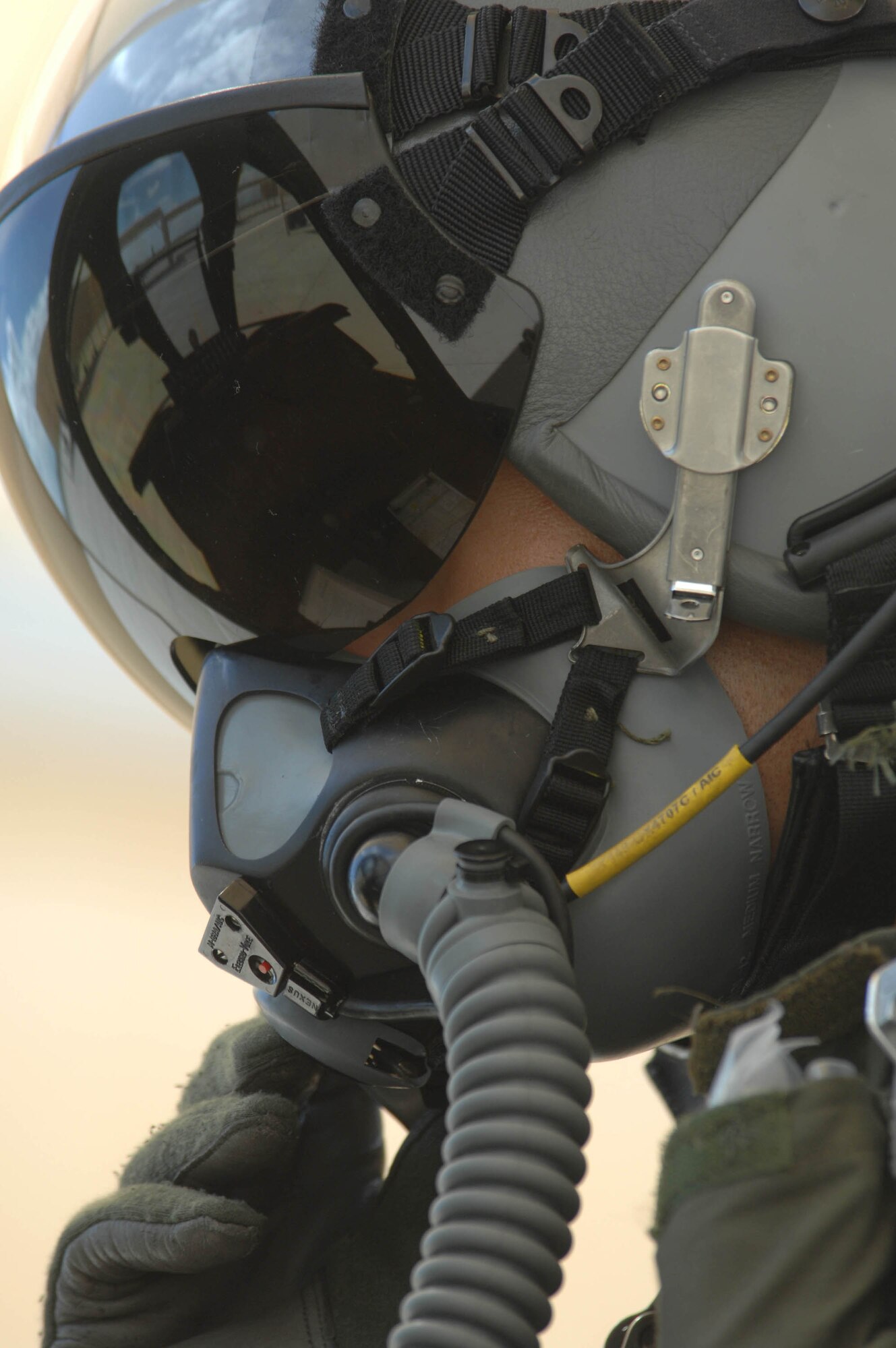 Second Lieutenant Robert Arena sits in his A-10 Thunderbolt II after completing the first A-10C pilot initial qualification course Aug. 2 at Davis-Monthan Air Force Base, Ariz. During the seven-month-long course, the training focused on the new A-10C platform which replaced the A-10A. The pilots also learned the basics of being attack pilot wingmen, which included flying in formation to provide mutual support, communicate with radios and kill the assigned target on the first attempt. Lieutenant Arena is an A-10 pilot with the 357th Fighter Squadron. (U.S. Air Force photo/Senior Airman Christina D. Ponte)