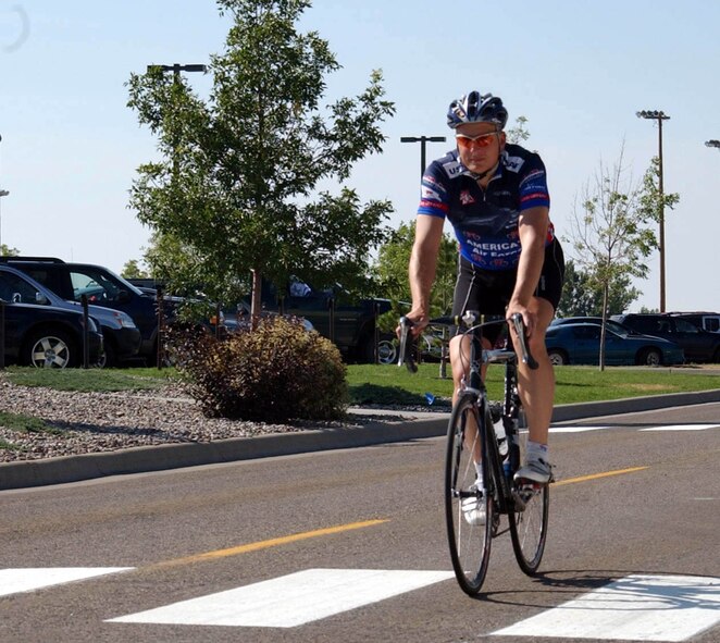 Master Sgt. Tim Hezel, 341st MSS, rides his road bike during a training session in this file photo. Sergeant Hezel will participate in the ConocoPhillips Ride for master sergeant, in honor of his wife, Deborah, Sept. 8 and 9. 