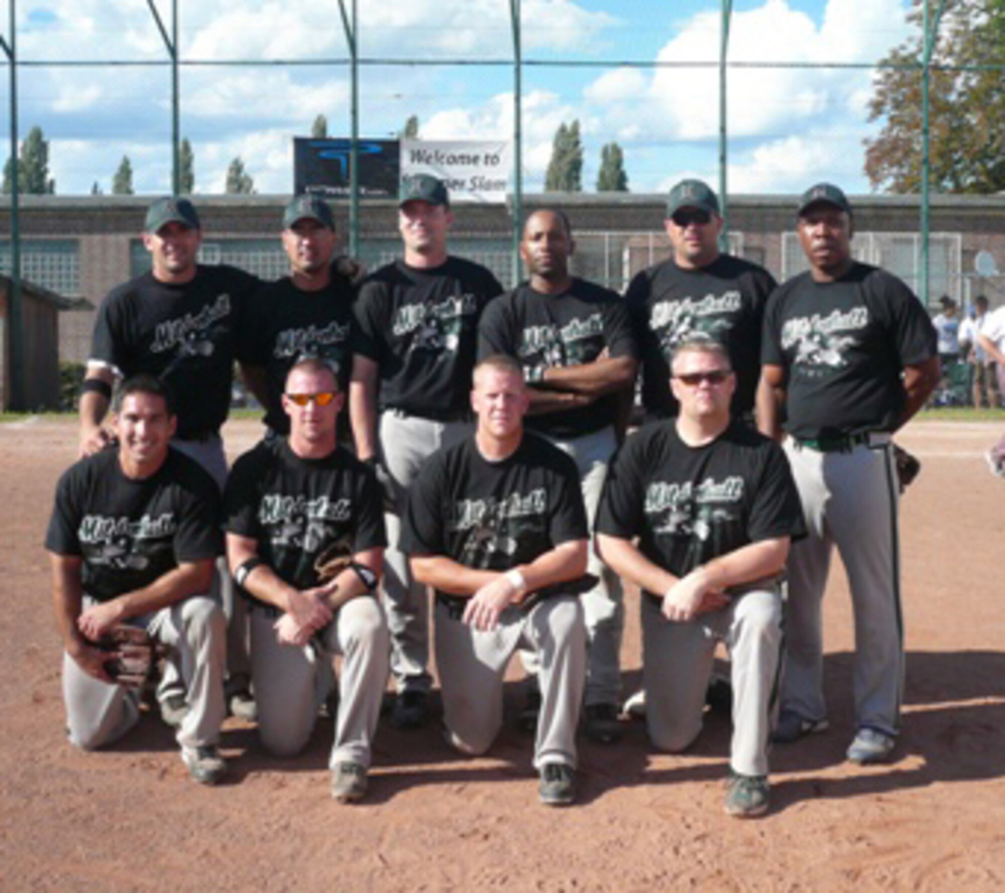 Team Mildenhall Men's softball team win the 16th Annual Summer Slam Tournament in Heidelberg, Germany July 20-22. RAF Mildenhall's winning team from Back Row (L to R) Dustin Hall, Tim Faircloth, Derek Bussard, Keith Jordan, Dennis Schipper, Stacey Moore. Front Row (L to R) Richard Henderson, John Mabie, Adam Jessee, Darin Berndt. (Submitted photo by Lona Berndt)