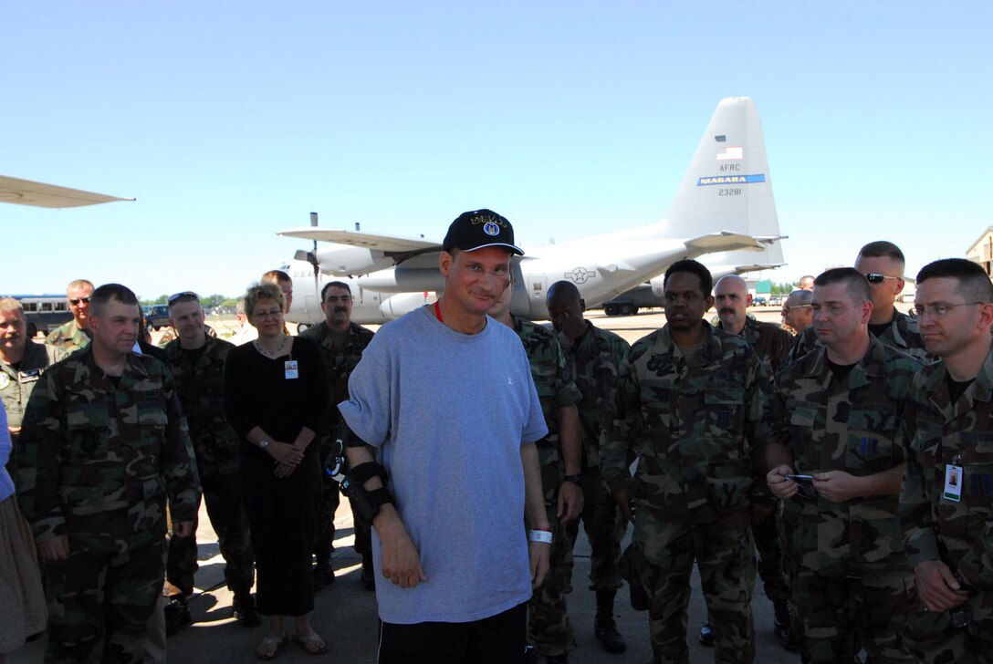 Niagara Falls Air Reserve Station, N.Y.  –  Reserve Tech. Sgt. Tim Juliano gets a lift home to Niagara Falls, New York aboard a 914th C-130, from Richmond, Virginia. Tech. Sgt Juliano received the Purple Heart for injuries he sustained in Iraq in June. Juliano was greeted by his family and friends upon arrival, and then taken to Buffalo Veterans Administration Medical Center to continue his recovery, after staying at Walter Reed Army Medical Center, Washington, D.C., and McGuire Veterans Administration Medical Center in Richmond, Virginia. (Photo By: Tech. Sgt. K Vester)