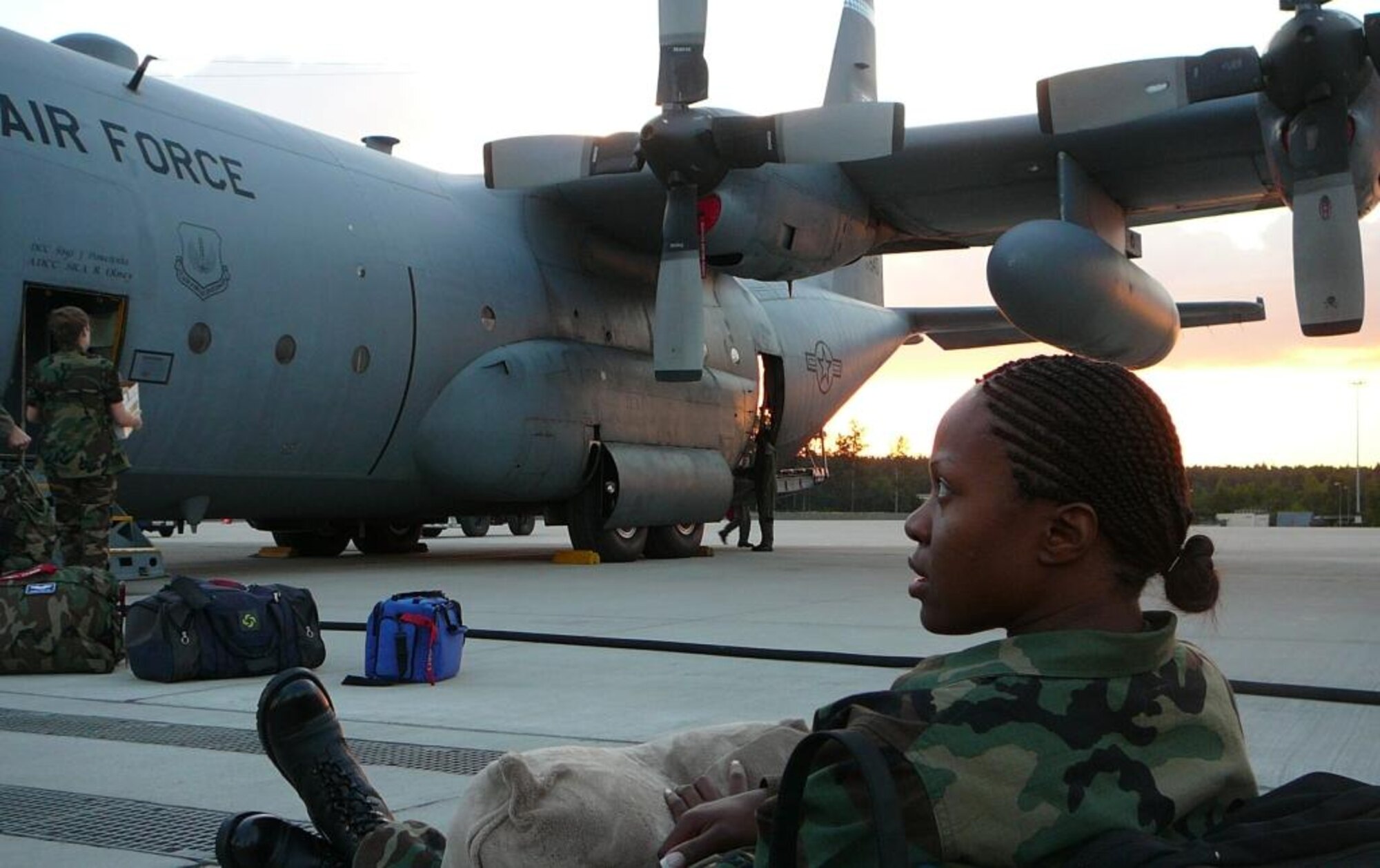 Staff Sgt. Vernee White, 86th Contingency Response Group weather specialist takes a break as she waits for her equipment in Romania. The CRG is aiding in joint exercises with the Army and Navy. (U.S. Air Force Photo/ Tech. Sgt. Shawn Smith)

