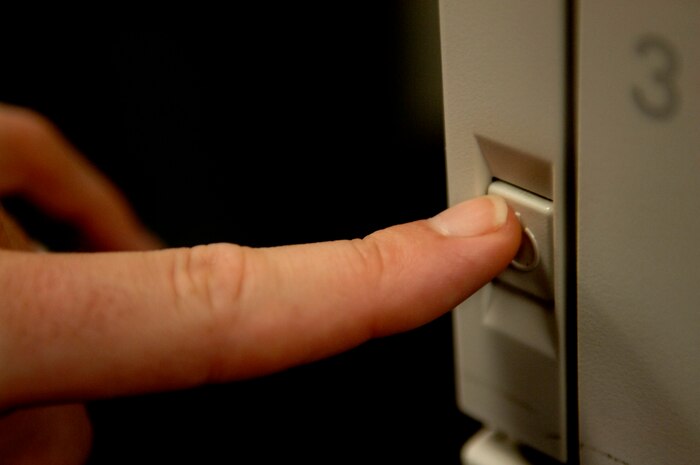 The 437th Communications Squadron promoted an Air Force Smart Operations of the 21st Century initiative of powering down computers nightly except for Tuesdays, when computers will be restarted instead.  (U.S. Air Force photo/Airman 1st Class Nicholas Pilch) 