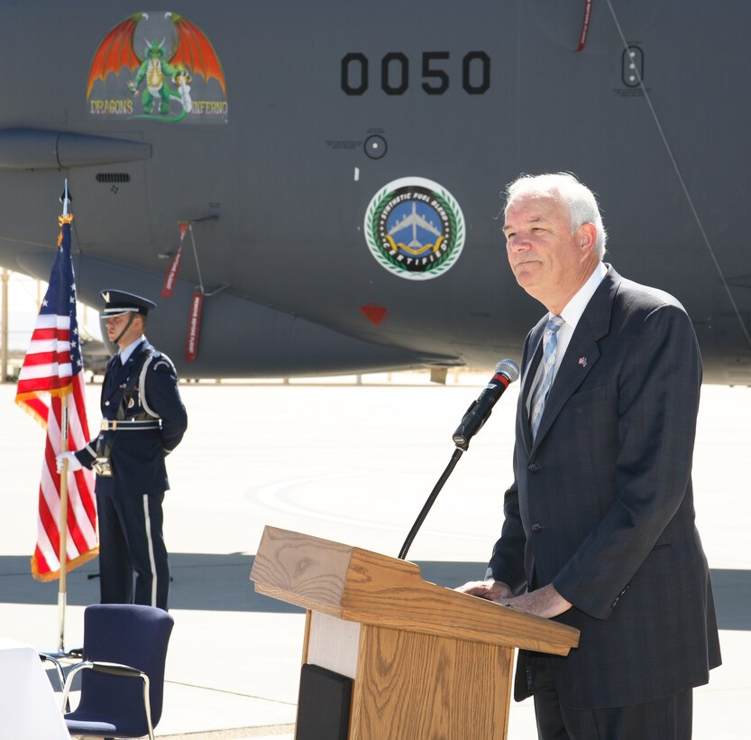 EDWARDS AIR FORCE BASE, Calif. -- Secretary of the Air Force Michael W. Wynne  fields questions from the media during a ceremony here Aug. 8, certifying Fischer-Tropsch synthetic fuel blends for use in the B-52H. (Photo by Jet Fabara)