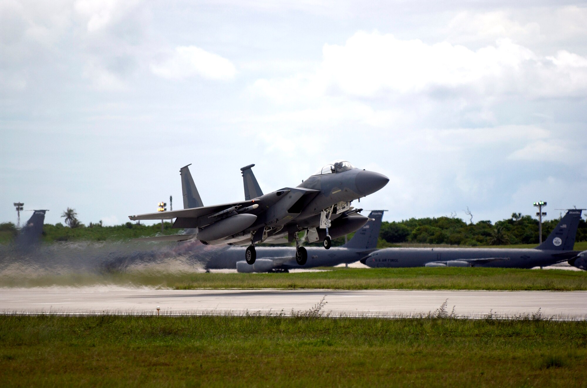 An F-15 Eagle takes off during Exercise Valiant Shield Aug. 8 from Andersen Air Force Base, Guam. Valiant Shield is an exercise that focuses on integrated joint training and interoperability among U.S. military forces while responding to a range of mission scenarios. Held in the Guam operating area, the exercise includes 30 ships, 280 aircraft and more than 20,000 servicemembers from the Navy, Air Force, Marine Corps and Coast Guard. The F-15 is assigned to the 44th Fighter Squadron from Kadena Air Base, Japan. (U.S. Air Force photo/Senior Airman Miranda Moorer)