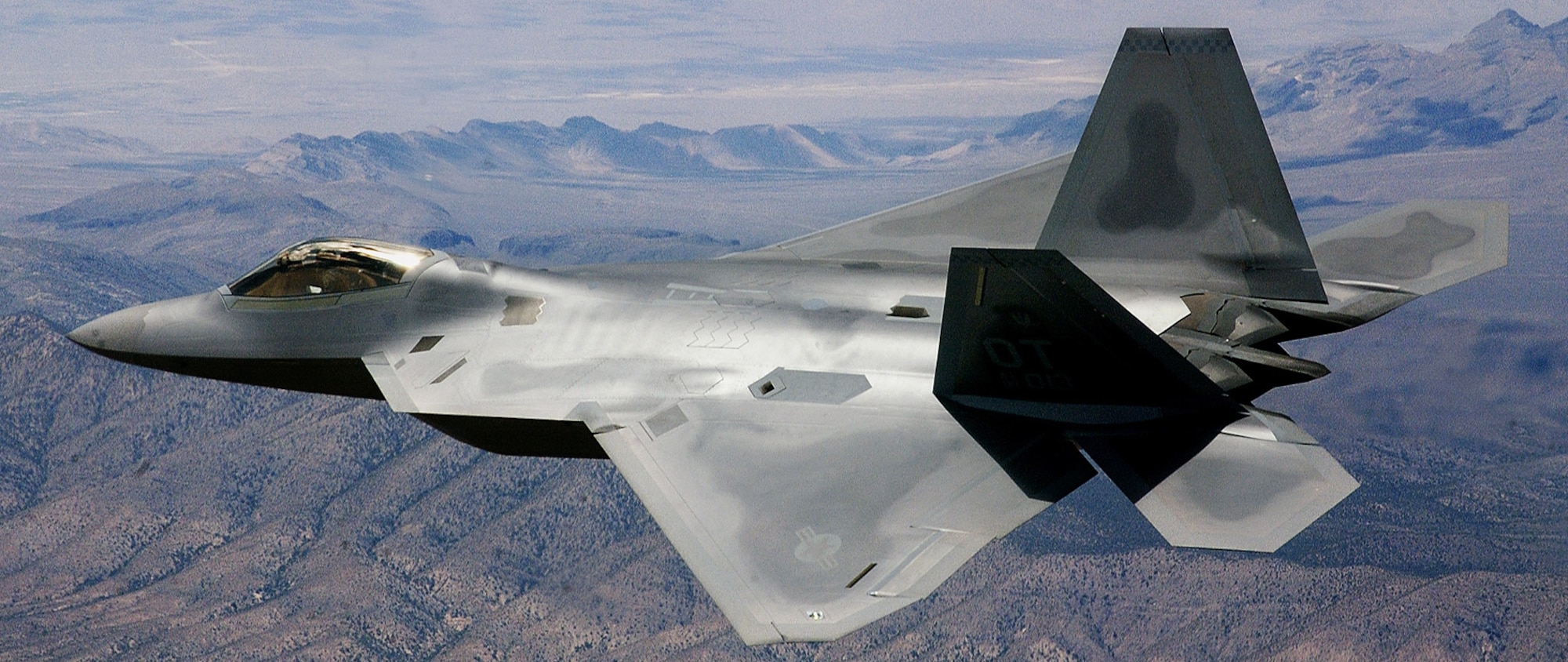 An F-22 Raptor heads out for an operational test mission. Air Force officials signed a production contract with Lockheed Martin Corp. to add 60 F-22s to the Air Force inventory by December 2011. The F-22 uses a combination of stealth, supercruise, maneuverability, and integrated avionics, coupled with improved supportability, and represents an exponential leap in warfighting capabilities. (U.S. Air Force photo/Tech. Sgt. Kevin J. Gruenwald)