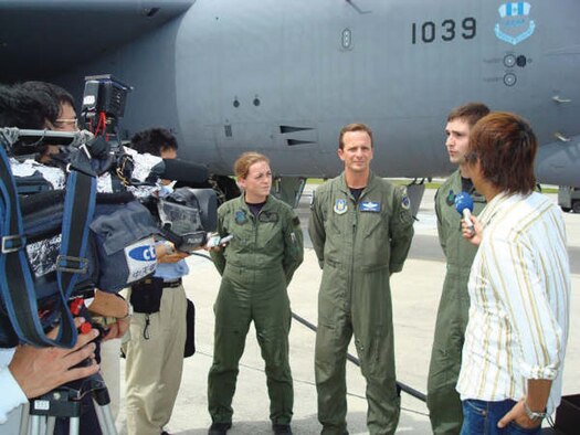 ANDERSEN AIR FORCE BASE, Guam-First Lt. Tiffany Bares, 20 Expeditionary Bomb Squadron, electronic warfare officer, Maj. Dennis Hienz, 93rd Bomb Squadron, B-52 pilot, and Capt. John Baker, 20th EBS, B-52 pilot talk to media regarding thier participation in the Valiant Shield exercise at Andersen Air Force Base, Guam. 
The week-long exercise, which tests the military’s ability to rapidly consolidate joint forces in response to regional contingencies, involves approximately 22,000 troops, 30 ships and some 275 aircraft. (U.S. Air Force photo by Master Sgt. Art Webb)
