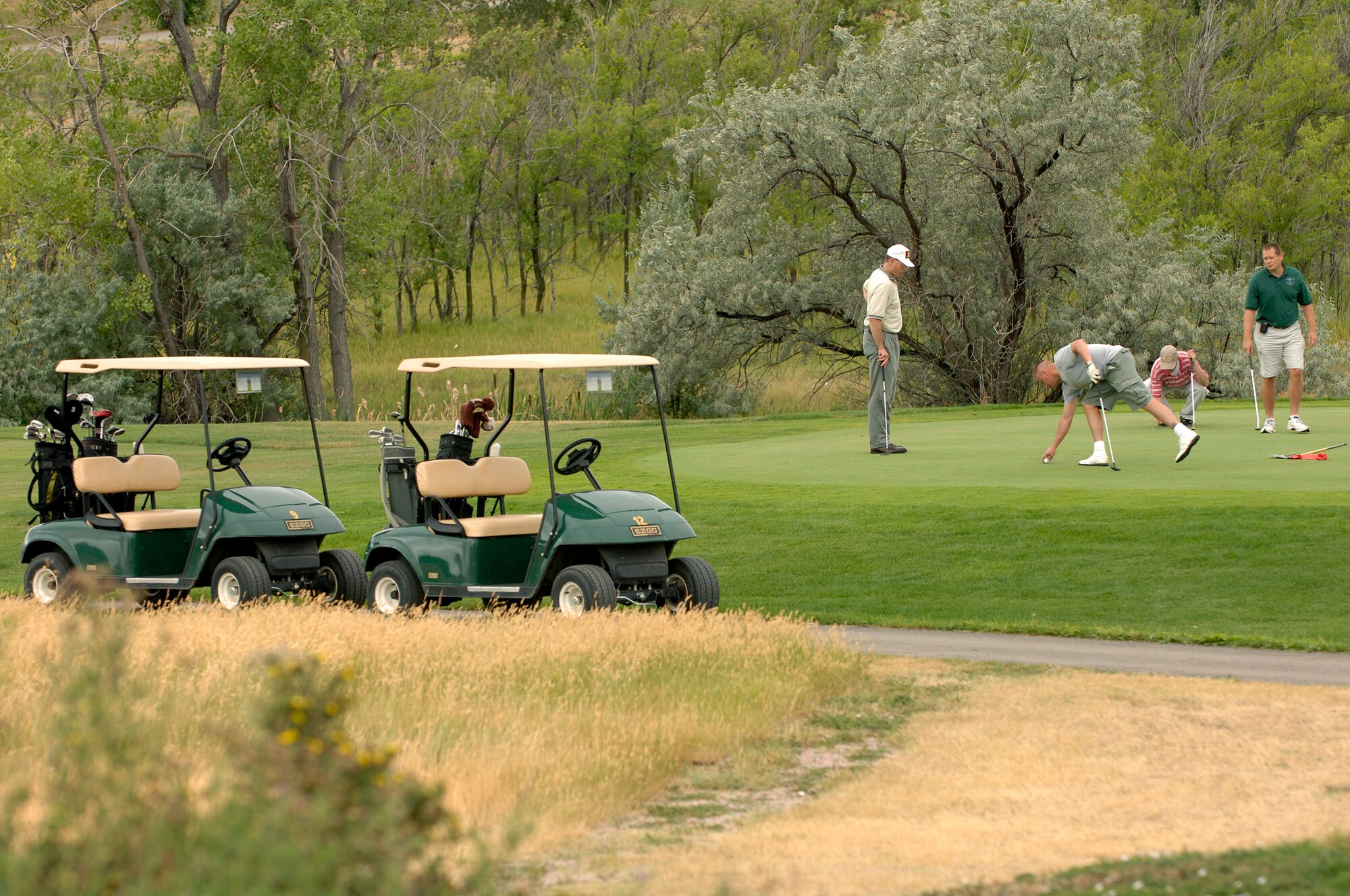 28th Security Forces Squadron personnel participate in the 28th Bomb Wing First Sergeants Association annual golf tournament at Ellsworth Air Force Base, S.D., Aug. 3, 2007.  The tournament raised $1,700 which will be used for various Ellsworth enlisted functions, awards, and charities.  (U.S. Air Force photo by SSgt Michael B. Keller)(Released)