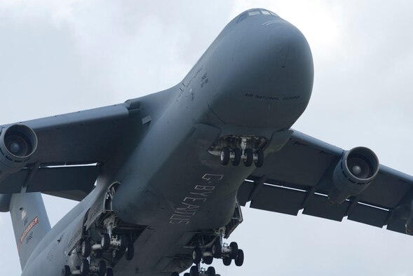 With a message of ‘G-Bye Altus’ displayed on its underside, the last C-5 departed Altus Air Force Base July 20 for its new home at the 167th Airlift Wing, Martinsburg, West Va. (U.S. Air Force photo/Senior Airman Joshua Demotts)